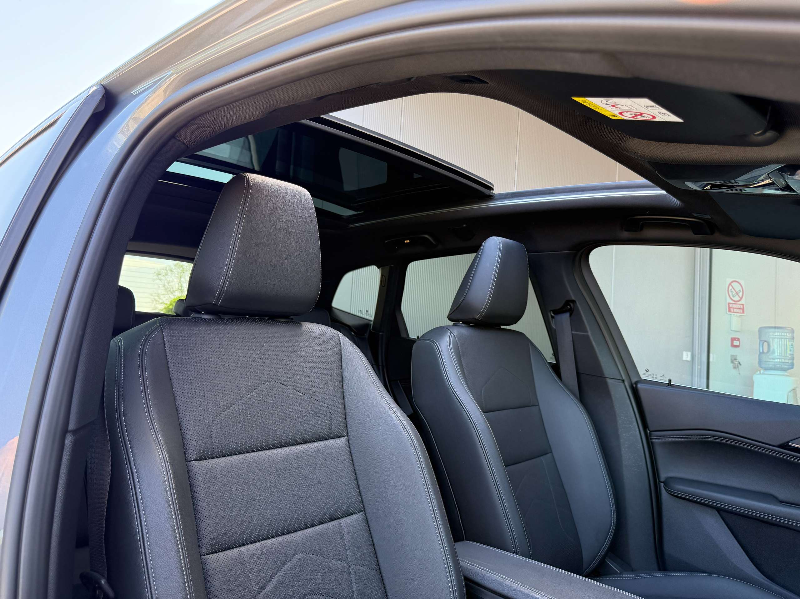 4b309a28-684a-4697-a31e-f3d713dfde3033-bmw-218-i-automaat-active-tourer-zwart-leder-opendak-camera-carplay.jpg