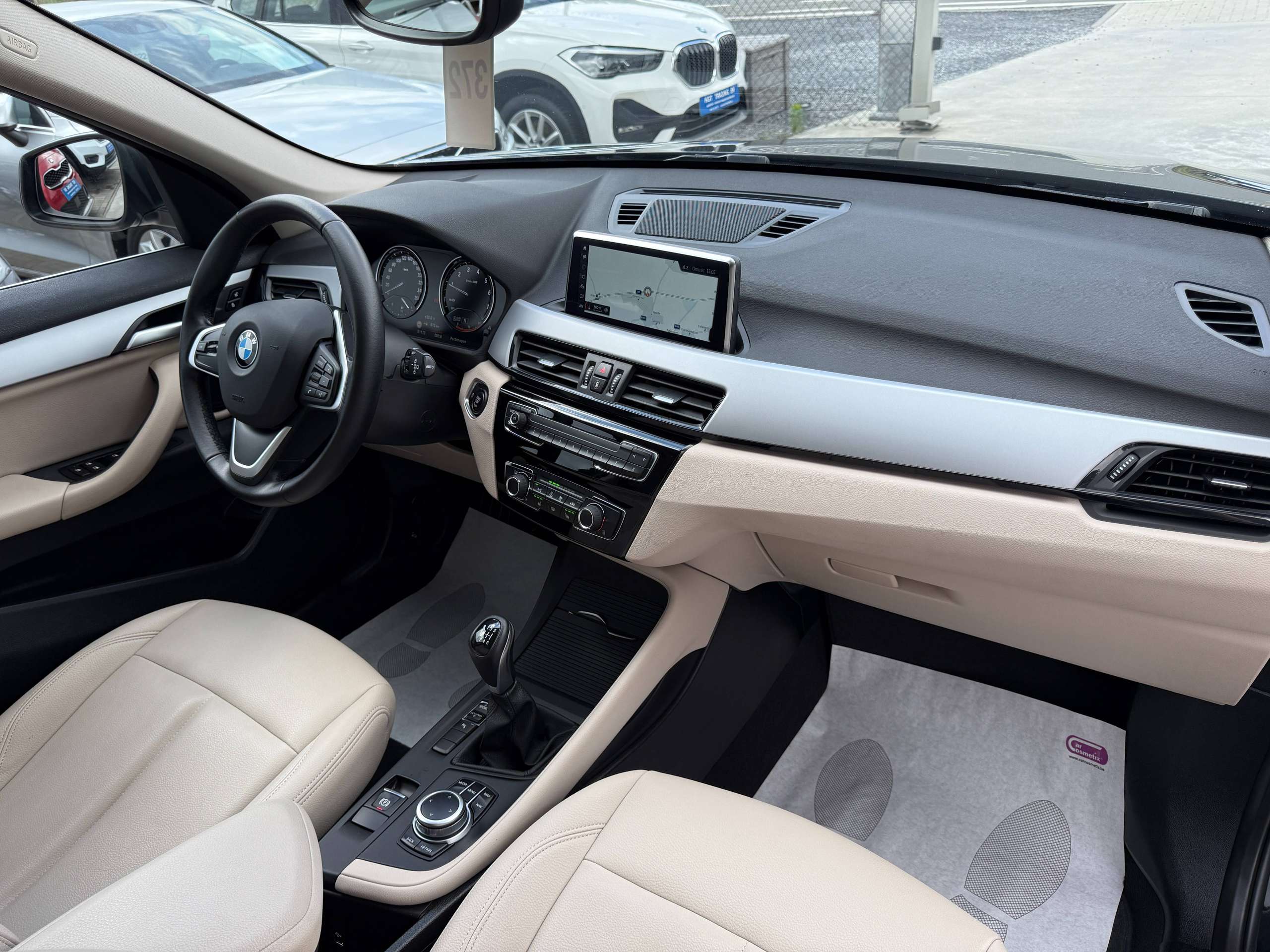 2935d72b-fdcc-40db-8324-14761554371b24-bmw-x1-1-5i-136pk-navigatie-pro-beige-leder-zetelverwarming-led-alu.jpg