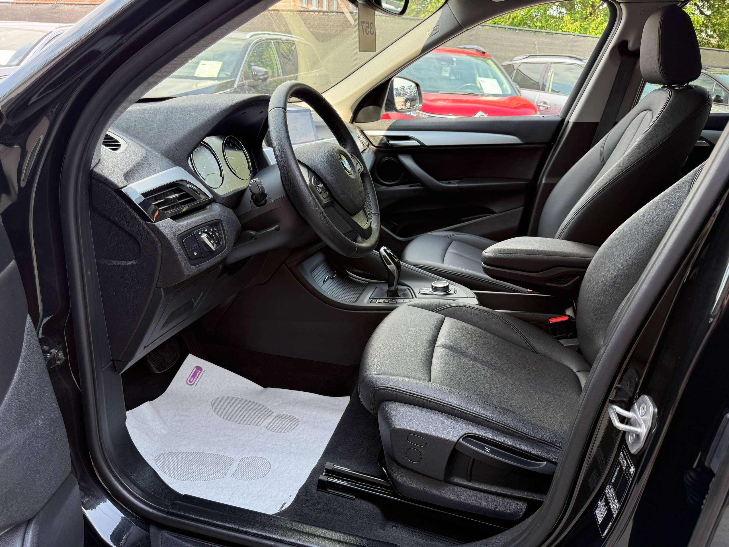 2d0bd1f9-9c93-4d04-8fef-56f6c959e7b711-bmw-x1-1-5i-136pk-automaat-navigatie-zwart-leder-bluetooth-led-pdc.jpg