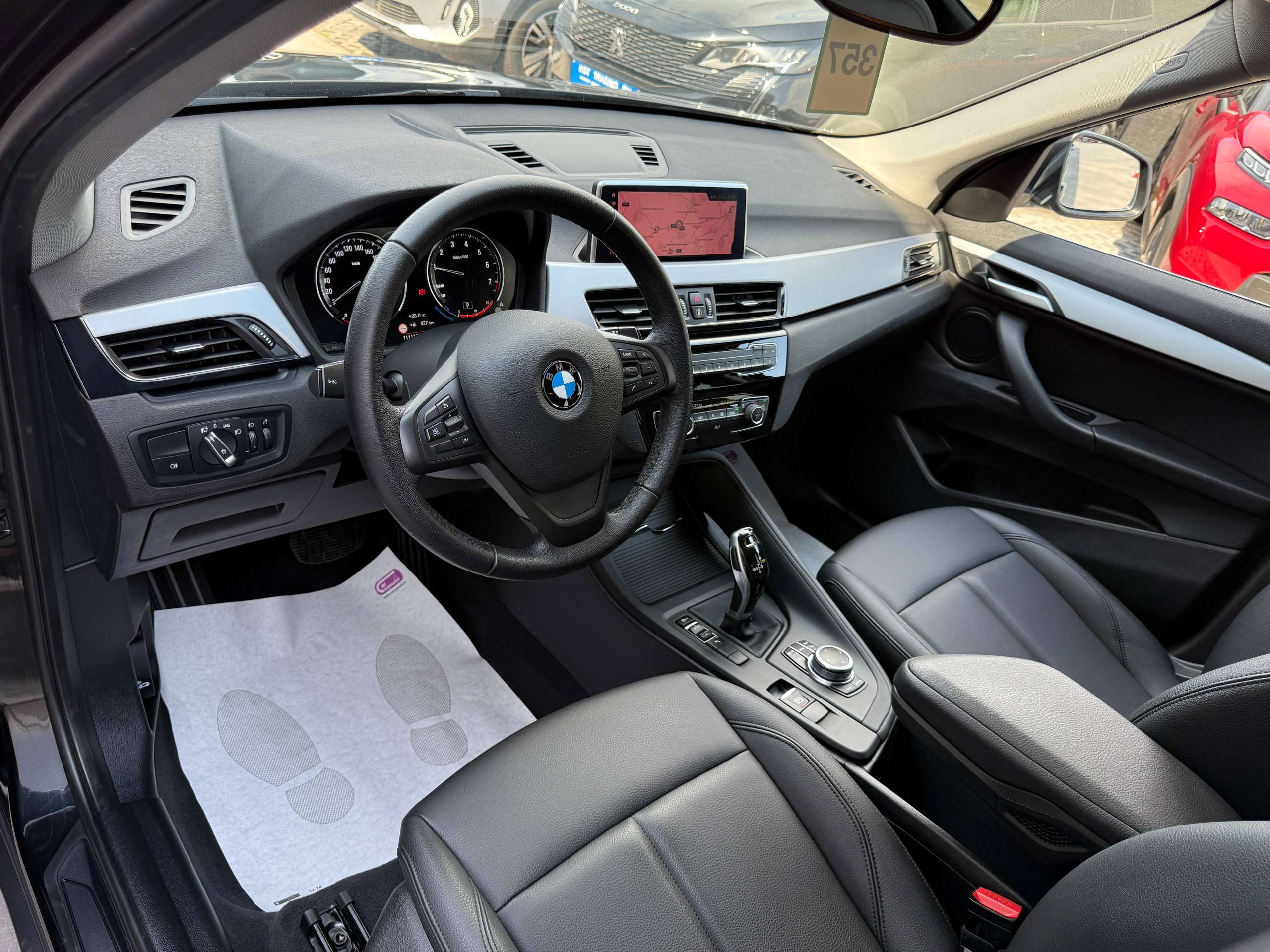 2d0bd1f9-9c93-4d04-8fef-56f6c959e7b712-bmw-x1-1-5i-136pk-automaat-navigatie-zwart-leder-bluetooth-led-pdc.jpg