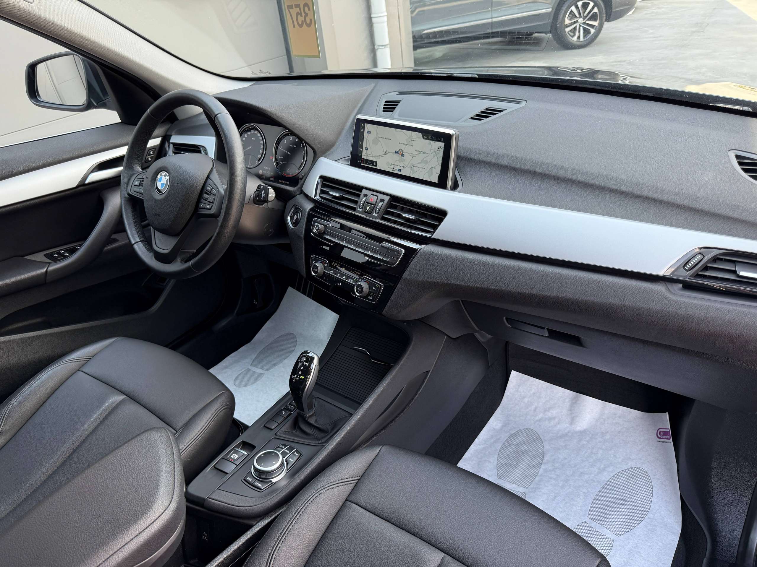 2d0bd1f9-9c93-4d04-8fef-56f6c959e7b723-bmw-x1-1-5i-136pk-automaat-navigatie-zwart-leder-bluetooth-led-pdc.jpg