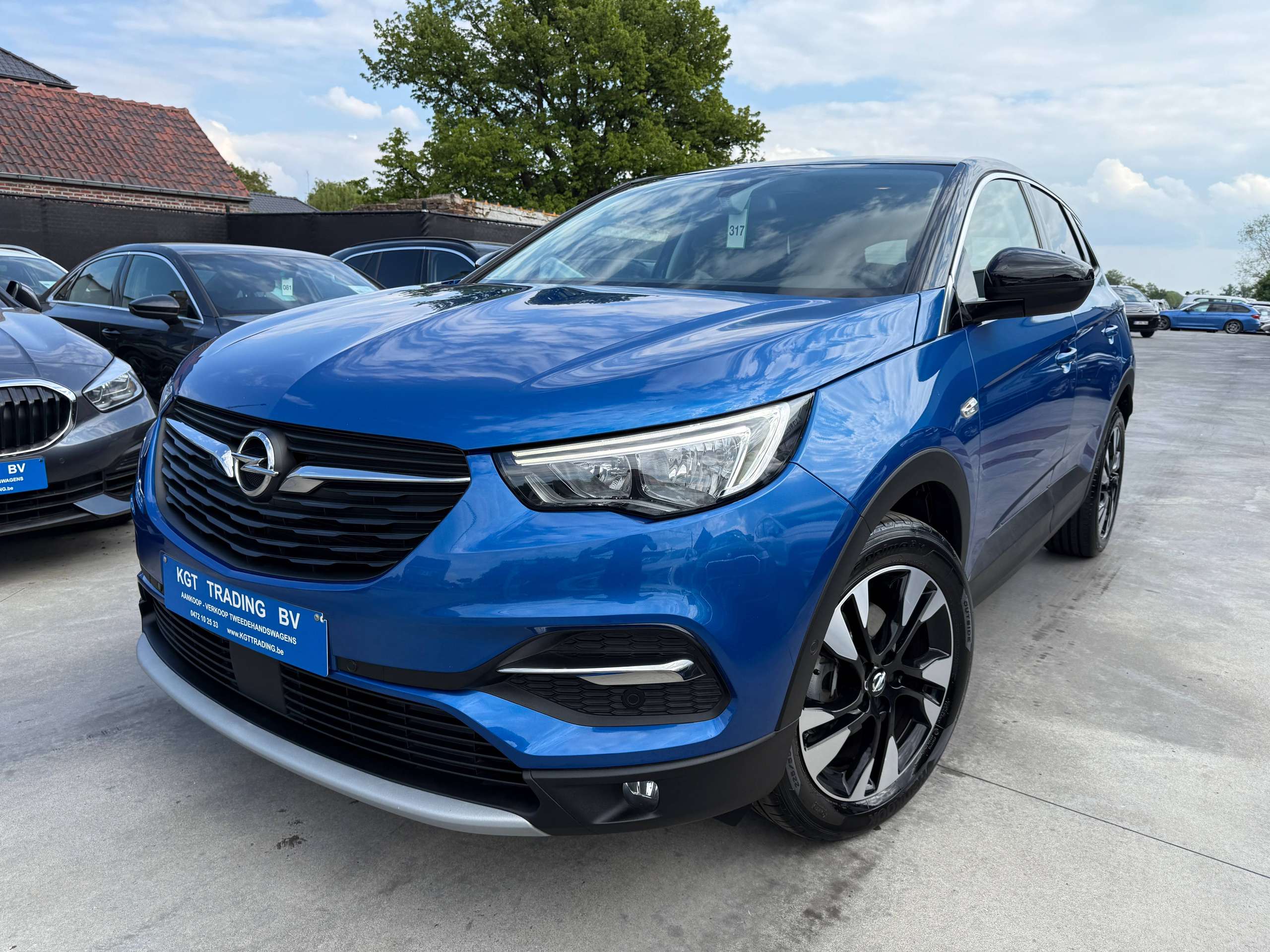 9b476b4b-c6e1-41ab-94aa-16866359b40e1-opel-grandland-x-1-2i-130pk-navigatie-carplay-camera-leder-led-alu.jpg