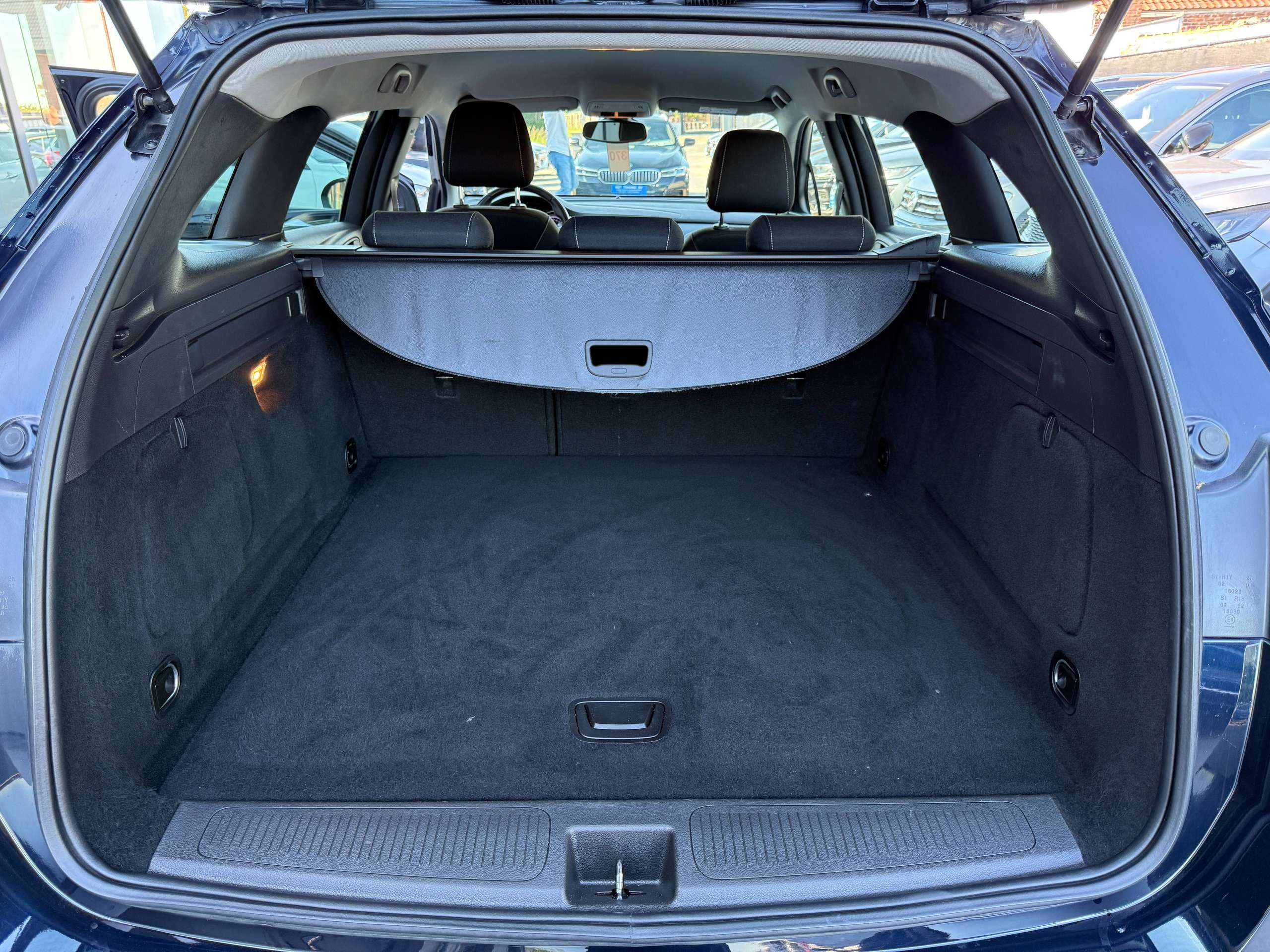 dd787c73-4d68-4092-9956-29271c608b1214-opel-astra-1-0i-105pk-tourer-navigatie-carplay-pdc-bluetooth-alu-carpass.jpg