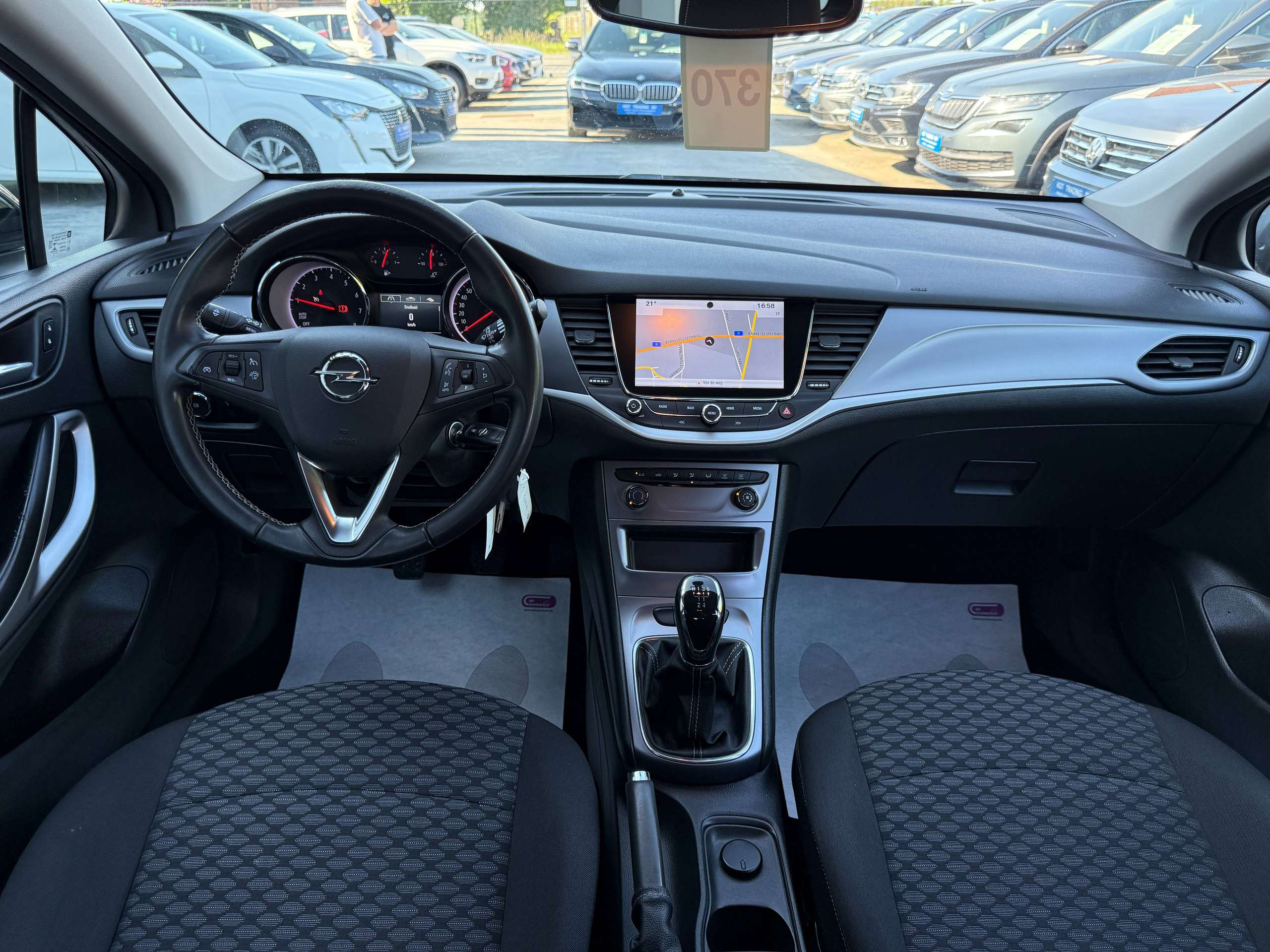 dd787c73-4d68-4092-9956-29271c608b1229-opel-astra-1-0i-105pk-tourer-navigatie-carplay-pdc-bluetooth-alu-carpass.jpg