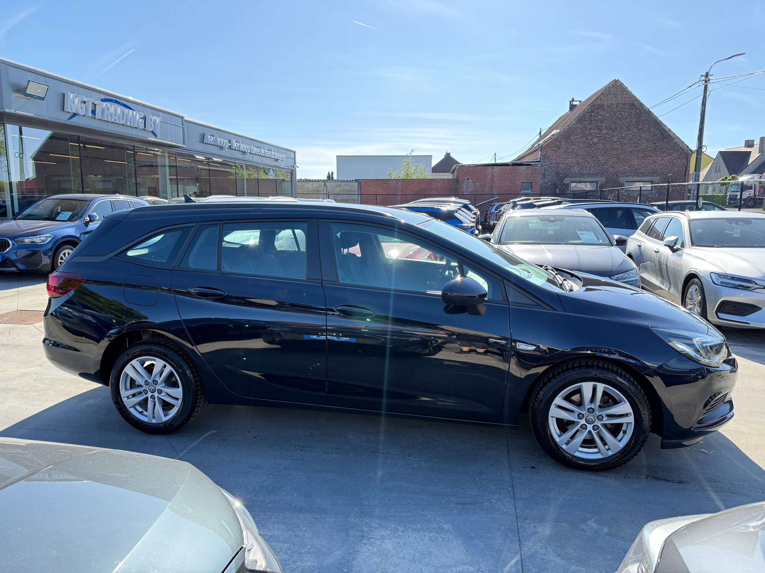 dd787c73-4d68-4092-9956-29271c608b124-opel-astra-1-0i-105pk-tourer-navigatie-carplay-pdc-bluetooth-alu-carpass.jpg