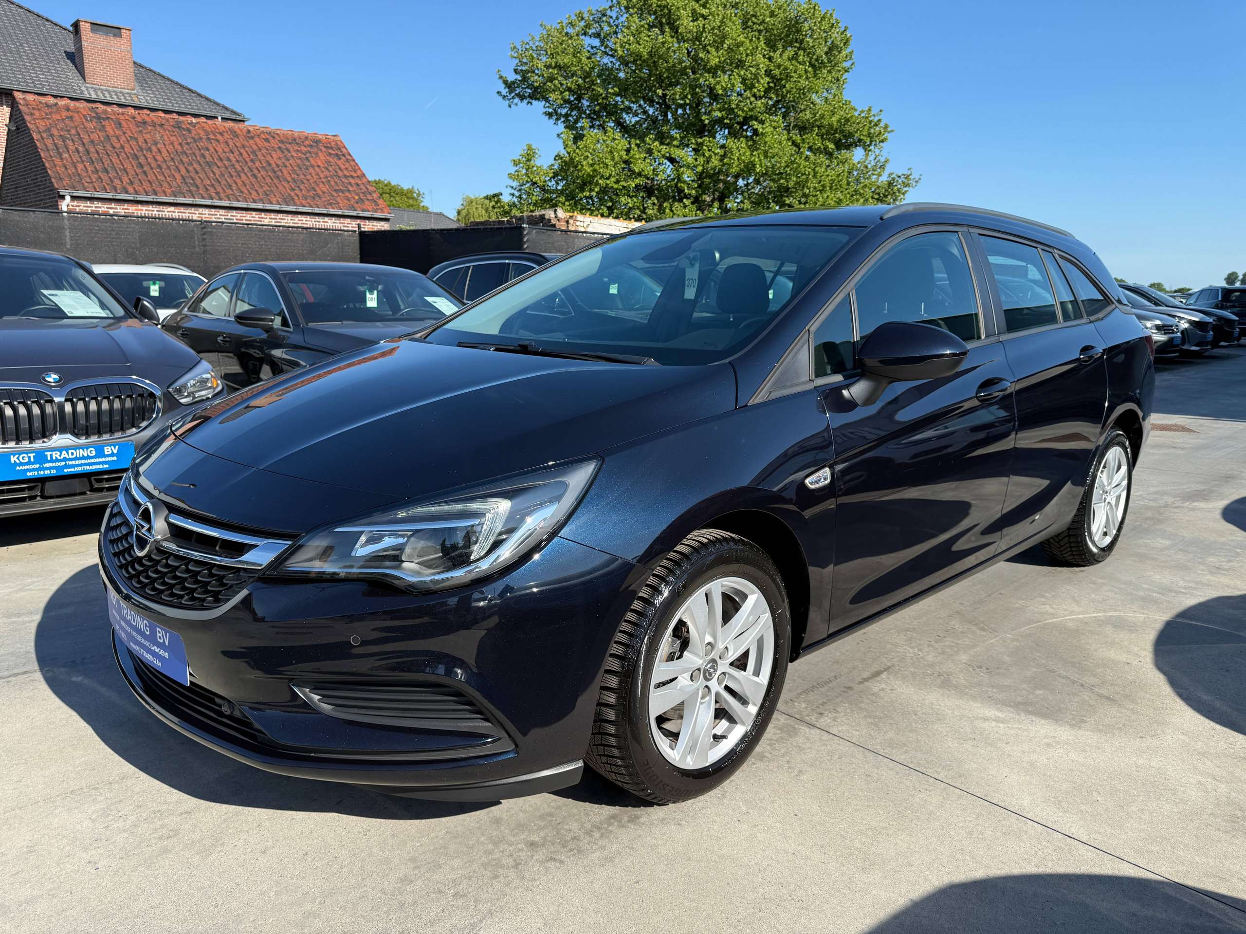 dd787c73-4d68-4092-9956-29271c608b129-opel-astra-1-0i-105pk-tourer-navigatie-carplay-pdc-bluetooth-alu-carpass.jpg