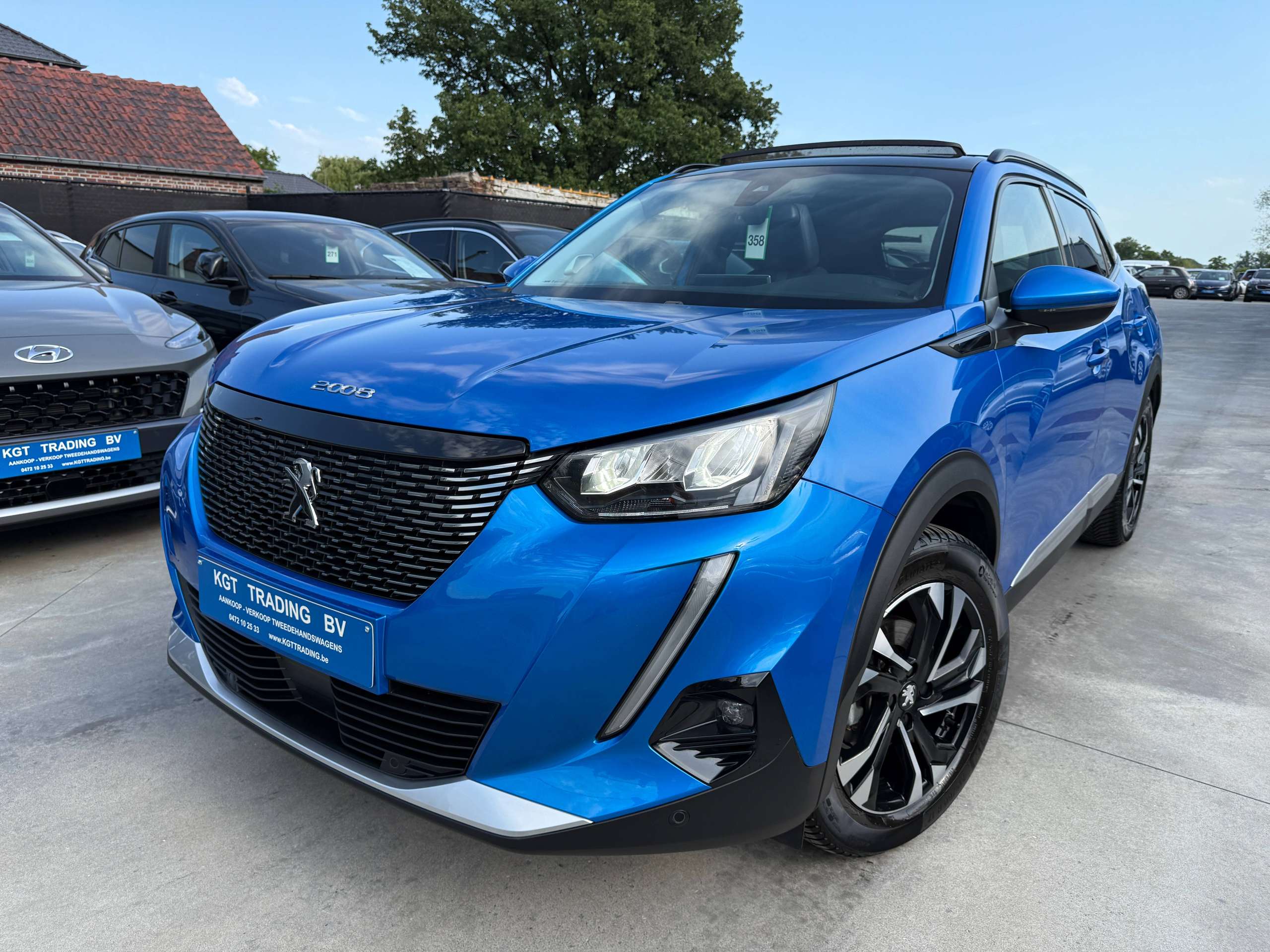 dfa7a58d-3954-45ba-afb2-5600983385e61-peugeot-2008-1-2i-130pk-automaat-opendak-navigatie-leder-virtual-camera-carplay.jpg