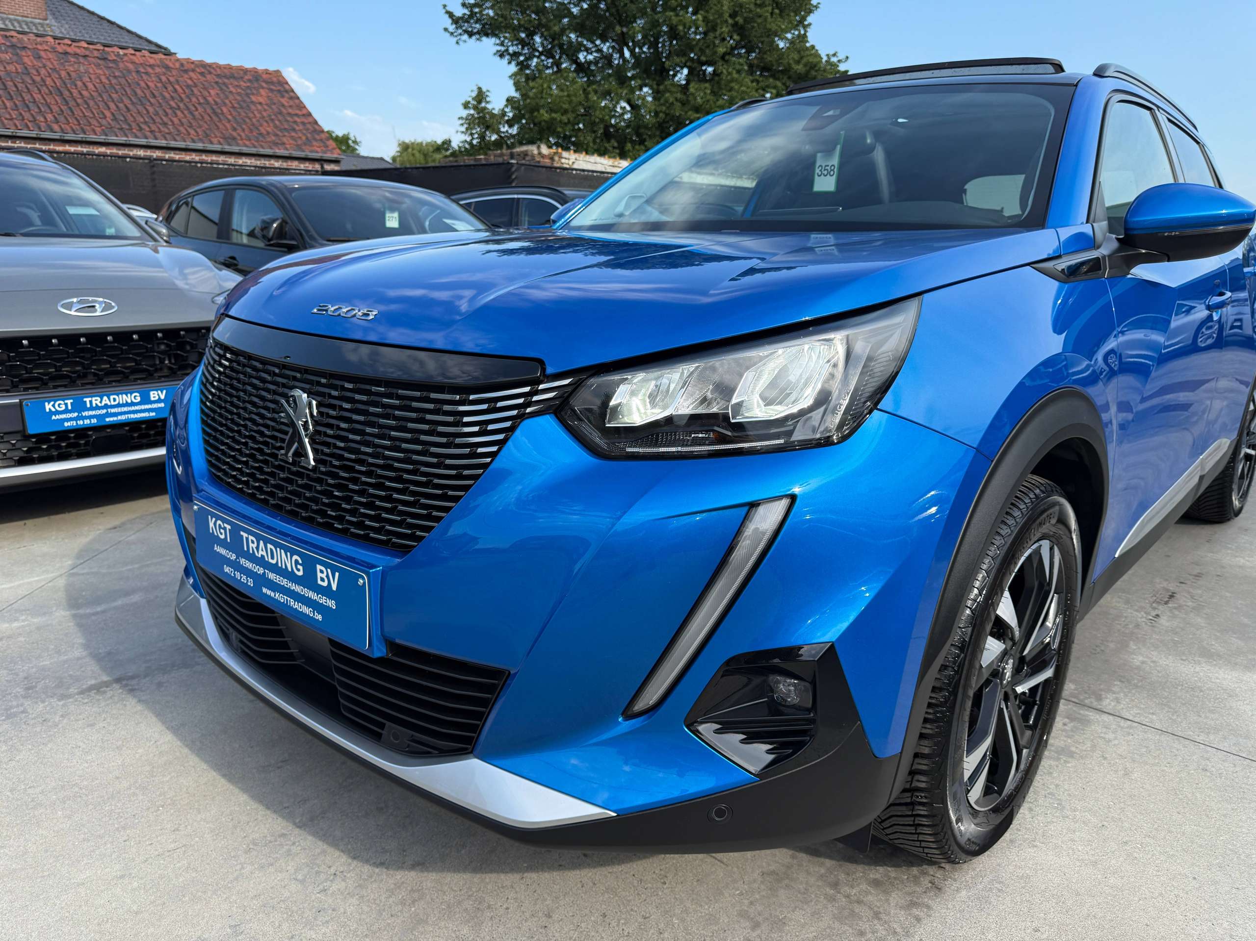 dfa7a58d-3954-45ba-afb2-5600983385e610-peugeot-2008-1-2i-130pk-automaat-opendak-navigatie-leder-virtual-camera-carplay.jpg