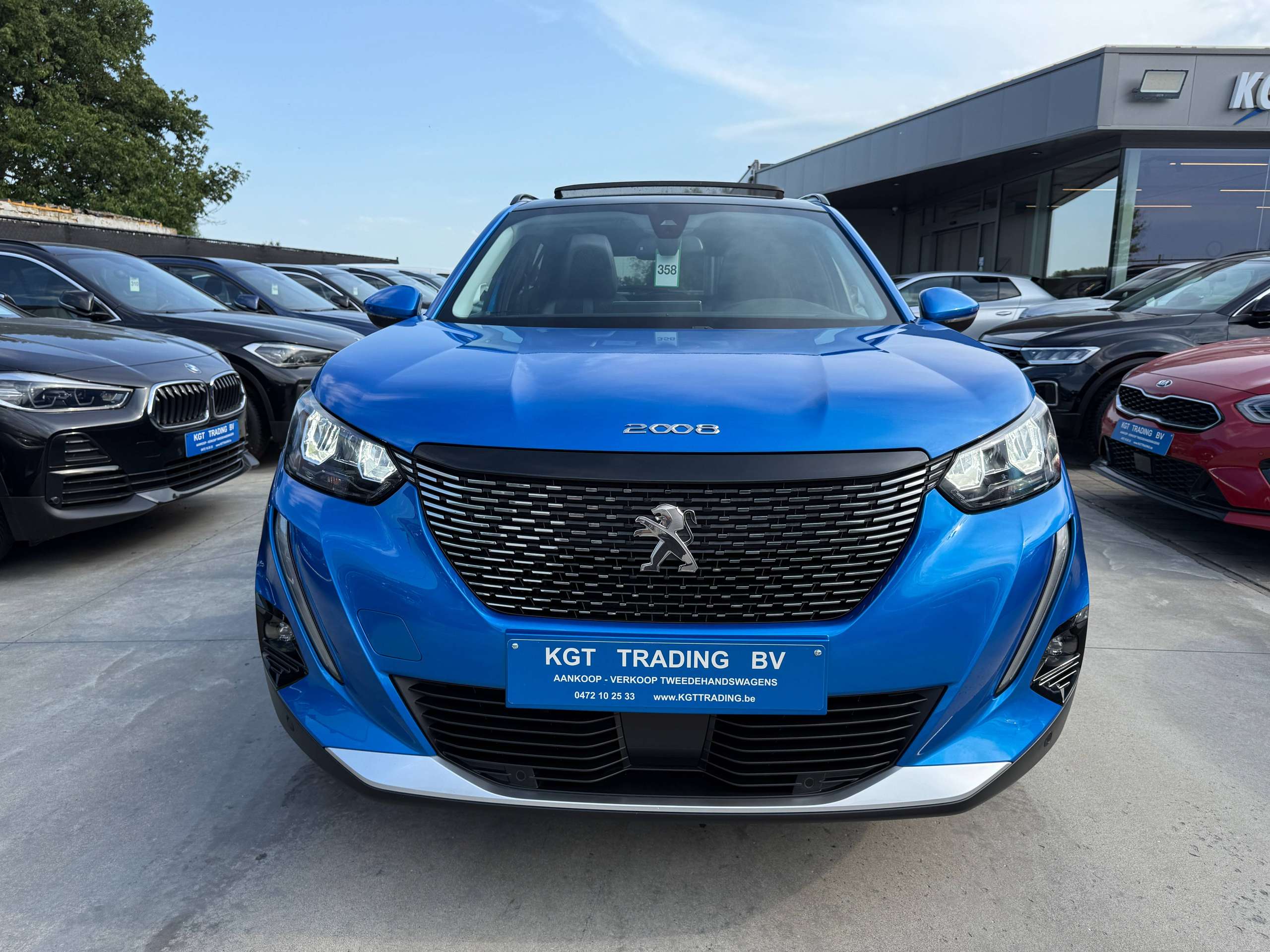 dfa7a58d-3954-45ba-afb2-5600983385e62-peugeot-2008-1-2i-130pk-automaat-opendak-navigatie-leder-virtual-camera-carplay.jpg