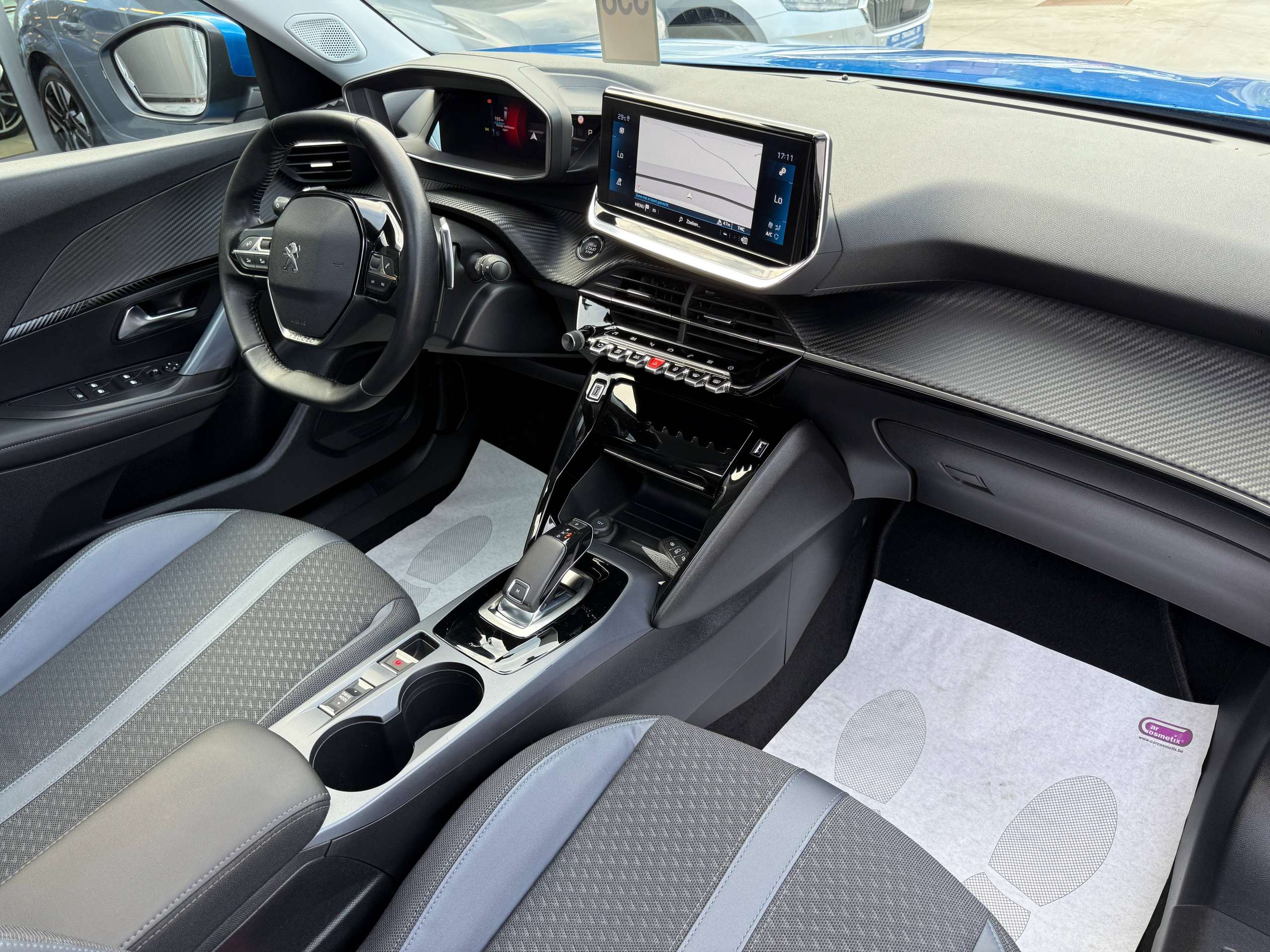 dfa7a58d-3954-45ba-afb2-5600983385e629-peugeot-2008-1-2i-130pk-automaat-opendak-navigatie-leder-virtual-camera-carplay.jpg