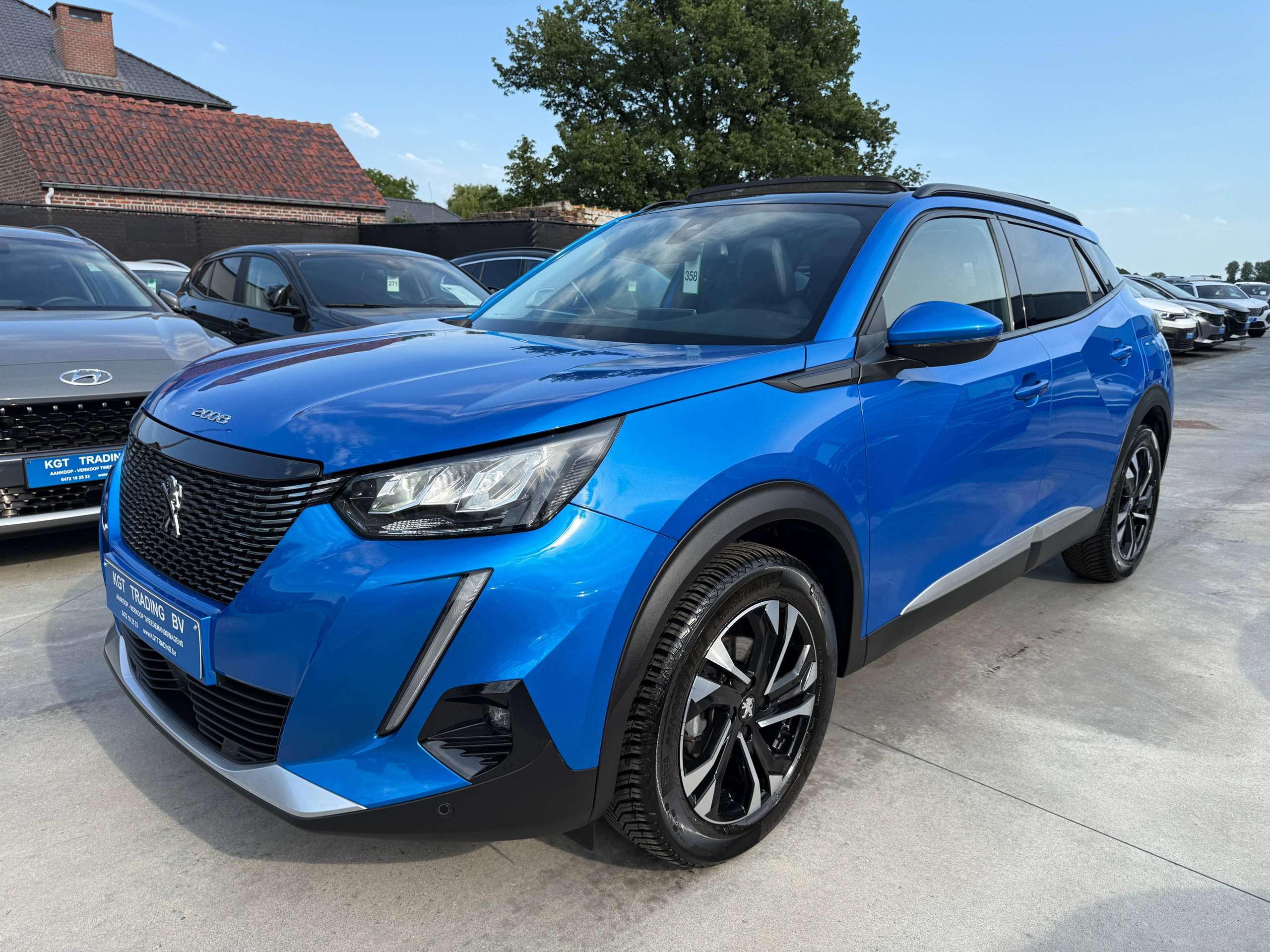 dfa7a58d-3954-45ba-afb2-5600983385e69-peugeot-2008-1-2i-130pk-automaat-opendak-navigatie-leder-virtual-camera-carplay.jpg
