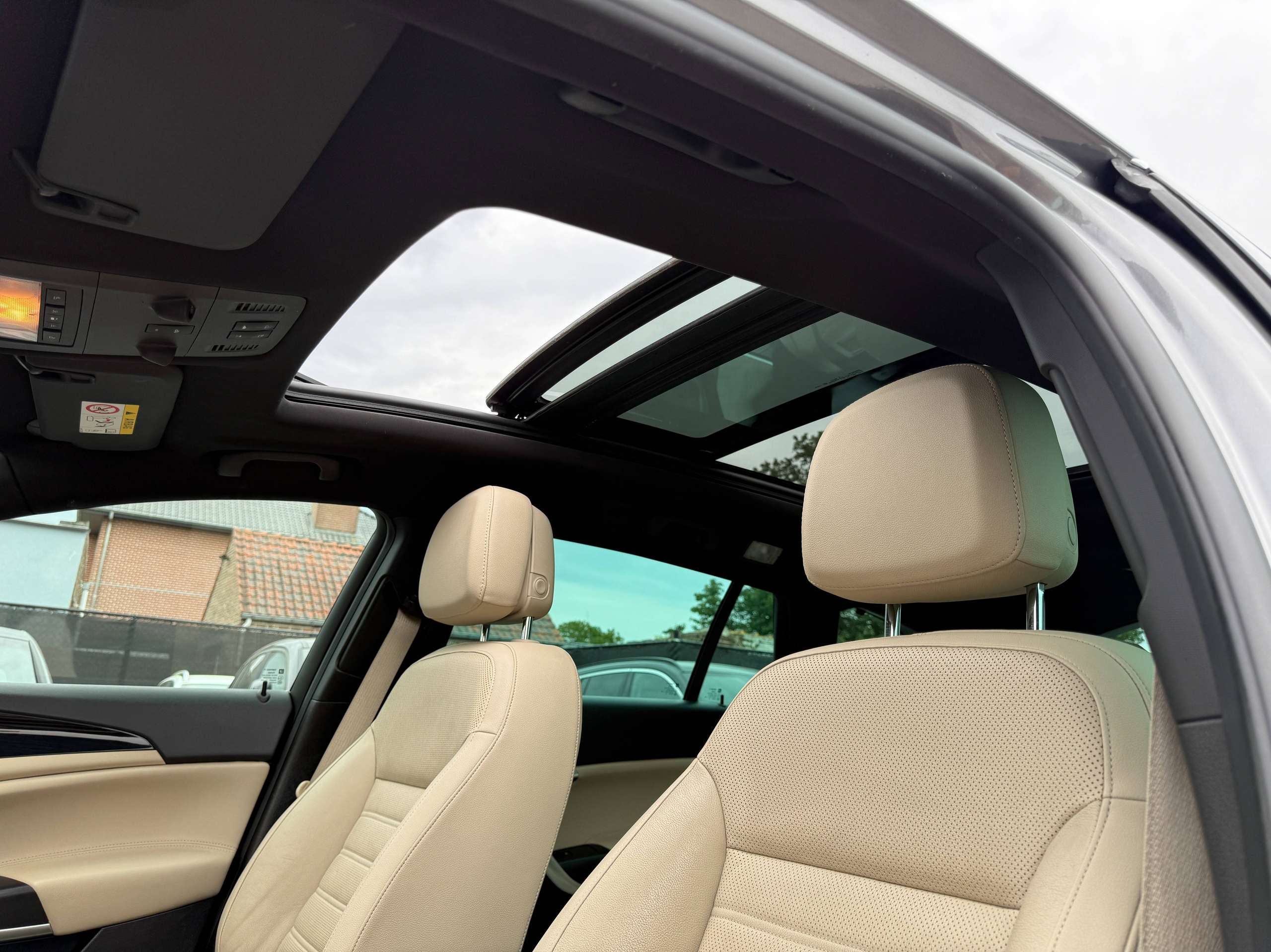 3fbe2751-5638-40d8-92dc-f318c67d4abe14-opel-insignia-tourer-1-6-cdti-136pk-navigatie-leder-opendak-camera-carplay.jpg