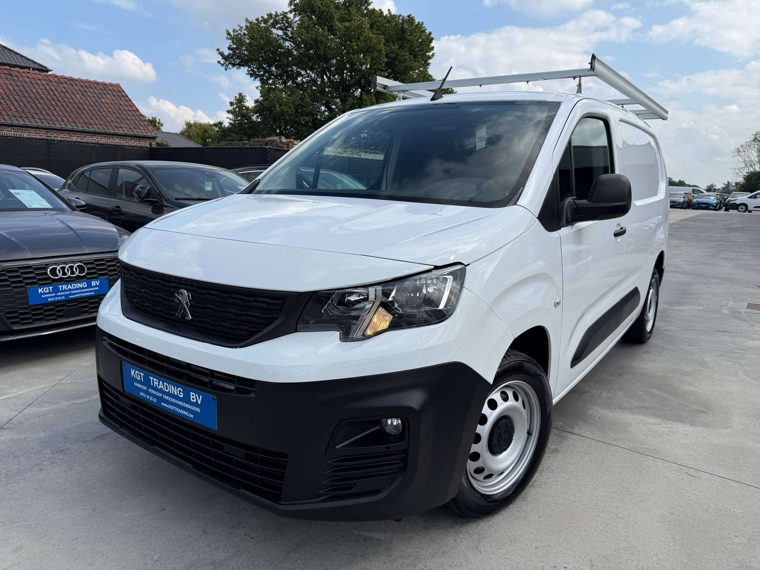 470afcfc-4332-4bed-9037-b1e336ba0f671-peugeot-partner-1-6-bluehdi-l2-100pk-dak-rek-bluetooth-parkeersensoren-airco.jpg