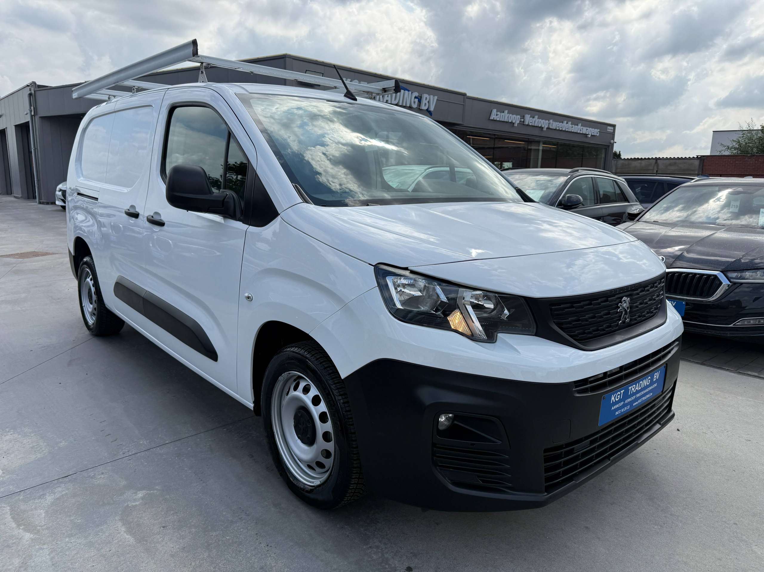 470afcfc-4332-4bed-9037-b1e336ba0f673-peugeot-partner-1-6-bluehdi-l2-100pk-dak-rek-bluetooth-parkeersensoren-airco.jpg