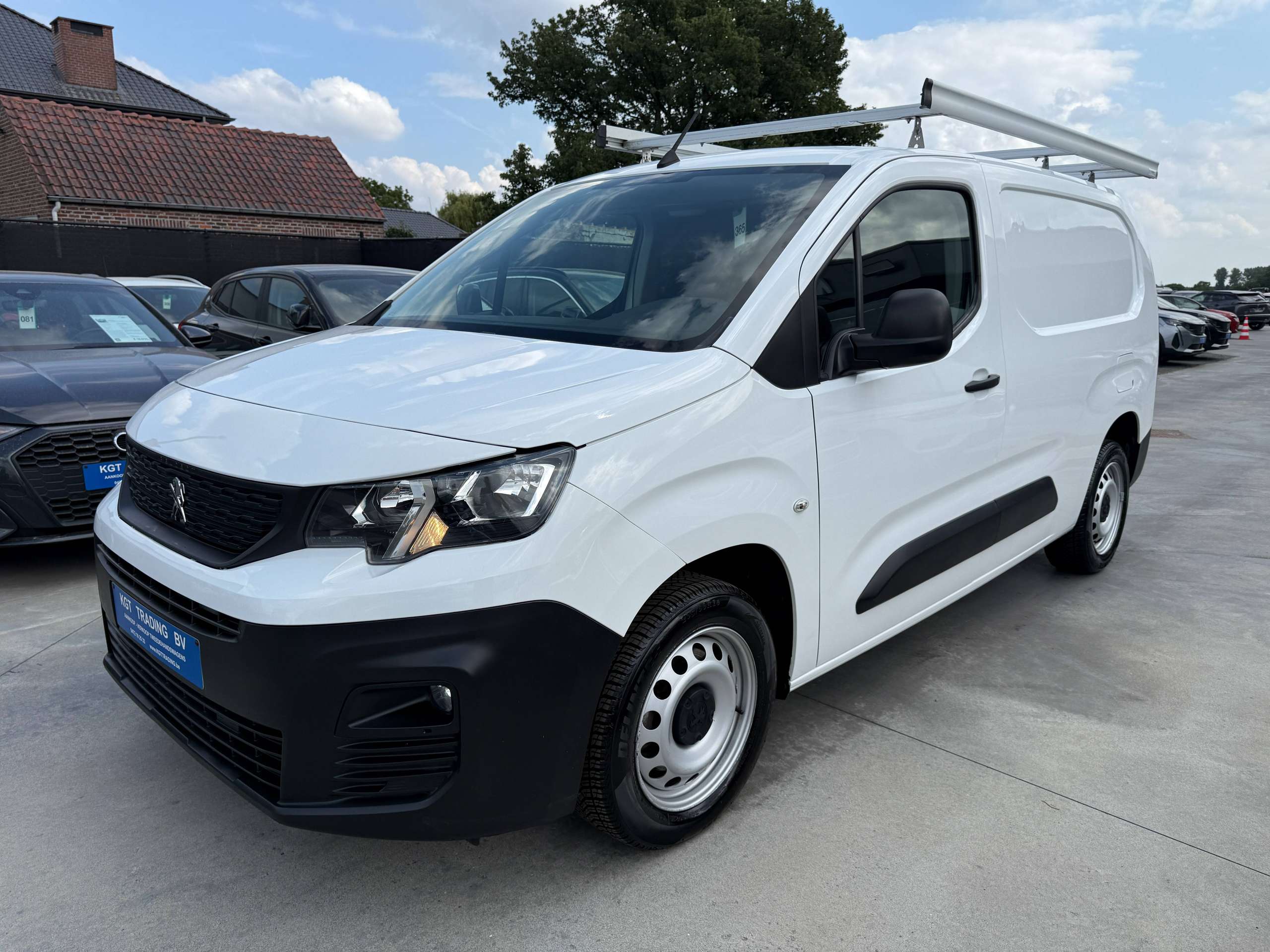 470afcfc-4332-4bed-9037-b1e336ba0f679-peugeot-partner-1-6-bluehdi-l2-100pk-dak-rek-bluetooth-parkeersensoren-airco.jpg