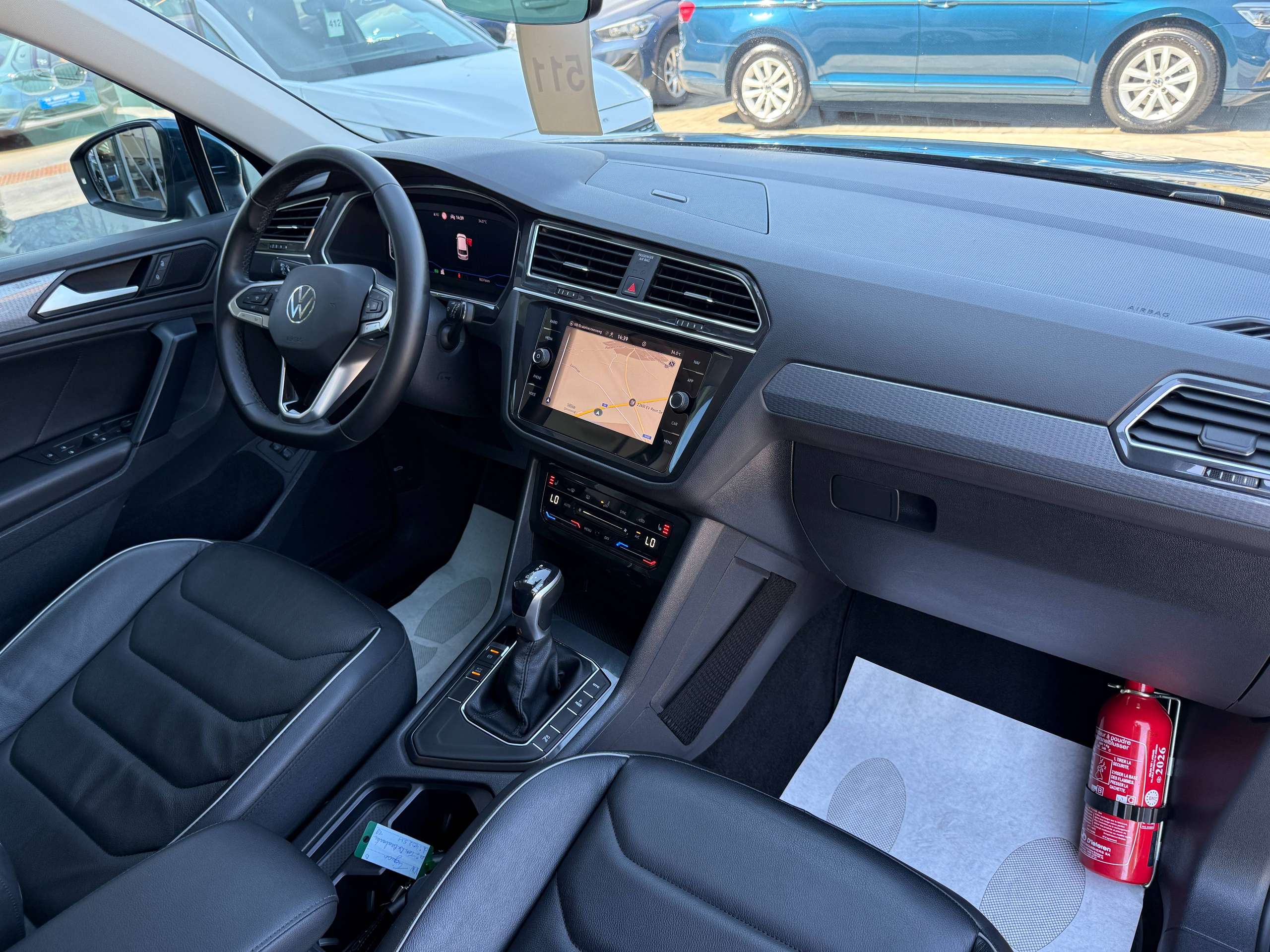 564f47de-299f-48ef-8c06-172e04f8db7440-volkswagen-tiguan-1-4i-e-hybrid-automaat-navigatie-full-led-zwart-leder-360-camera-carplay.jpg