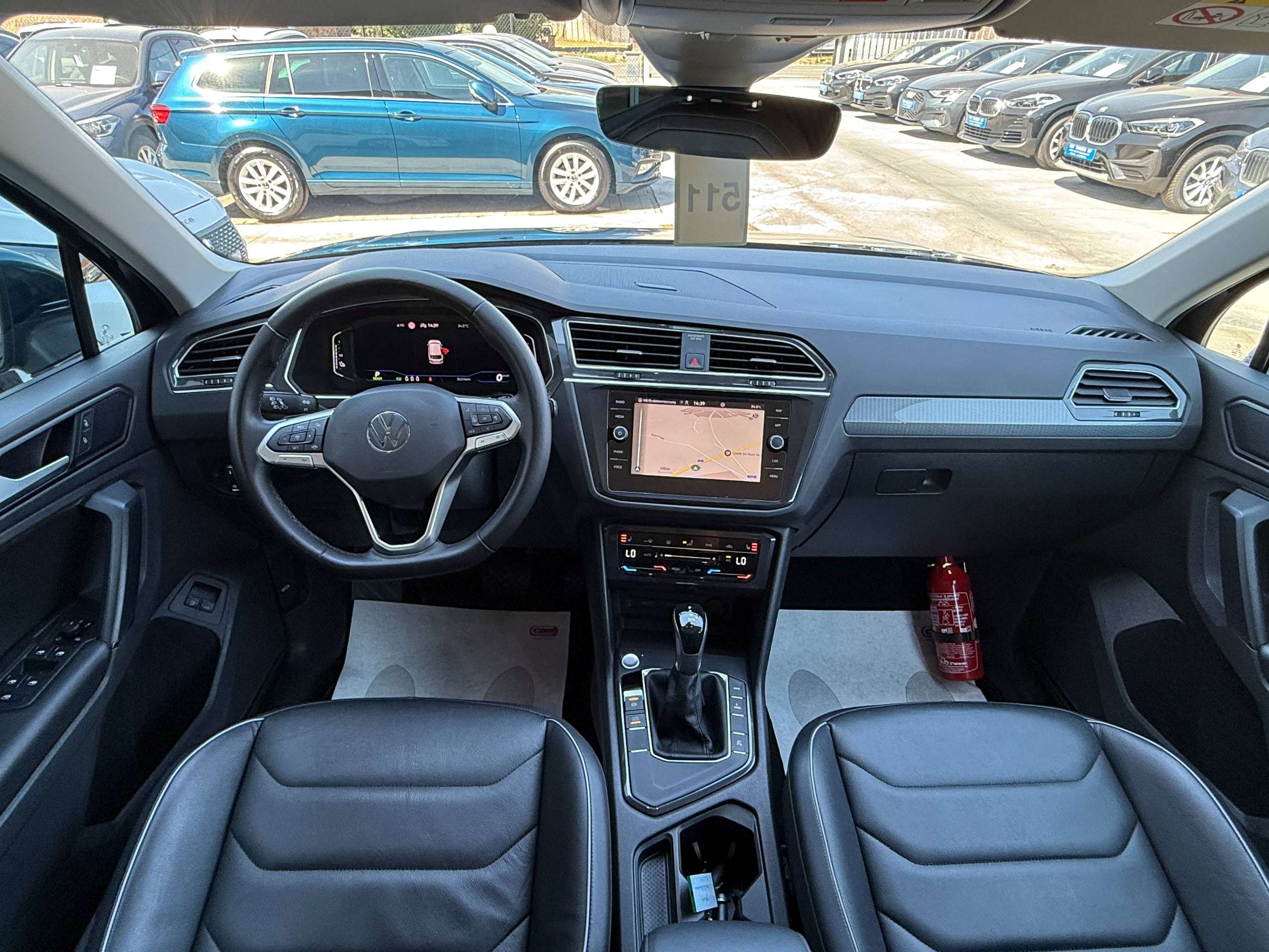 564f47de-299f-48ef-8c06-172e04f8db7444-volkswagen-tiguan-1-4i-e-hybrid-automaat-navigatie-full-led-zwart-leder-360-camera-carplay.jpg