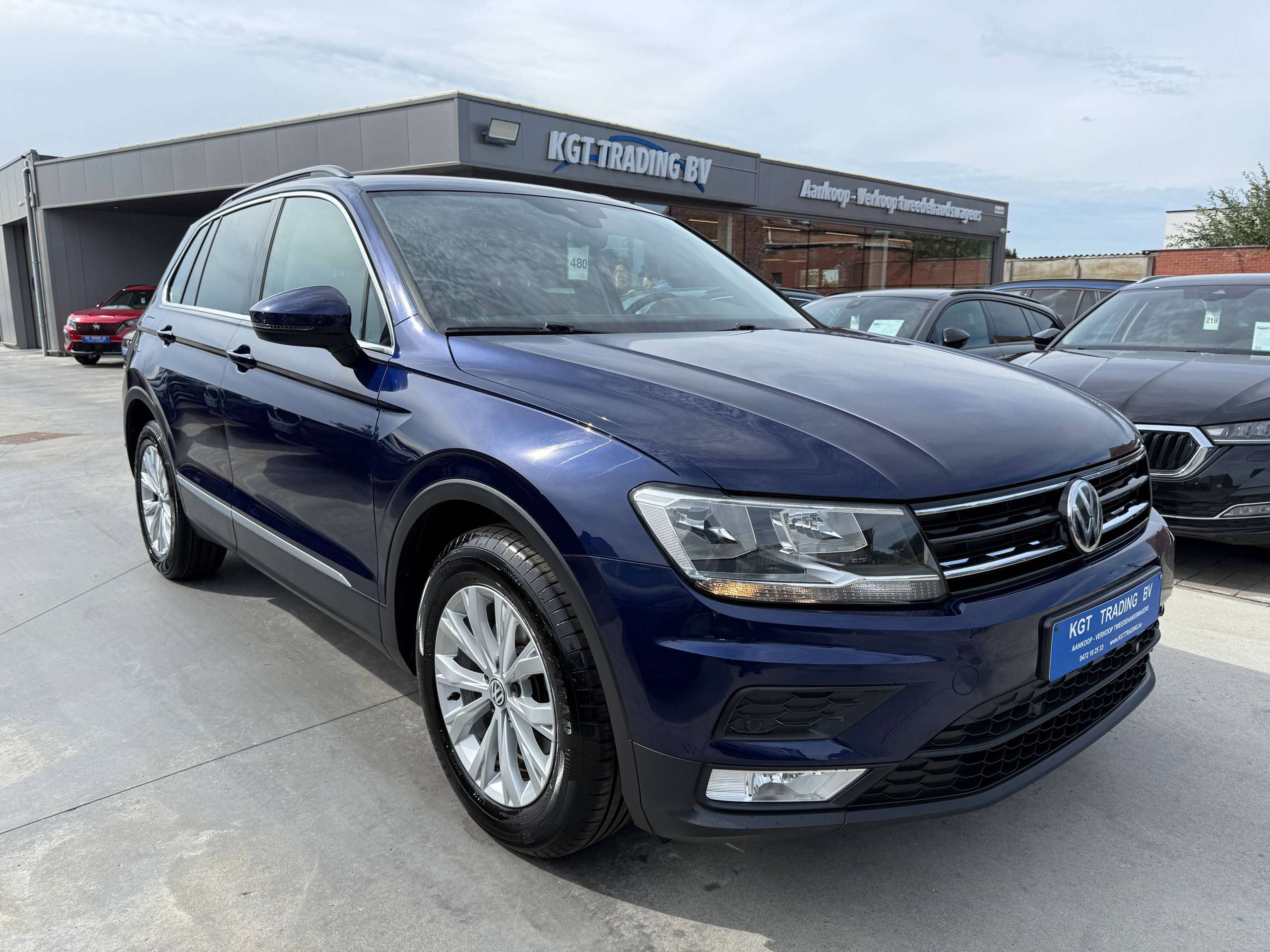 cdec456c-ed52-4a73-af94-2f690b1fb3083-volkswagen-tiguan-1-4-tsi-150pk-bluetooth-adaptieve-cruise-airco-pdc-va-carpass.jpg