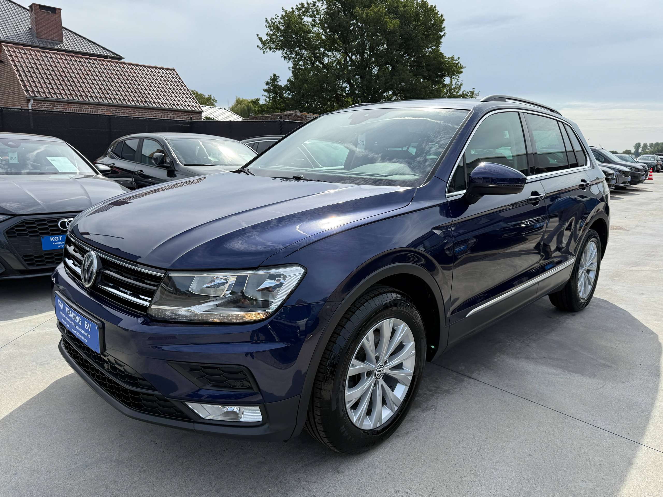cdec456c-ed52-4a73-af94-2f690b1fb3089-volkswagen-tiguan-1-4-tsi-150pk-bluetooth-adaptieve-cruise-airco-pdc-va-carpass.jpg