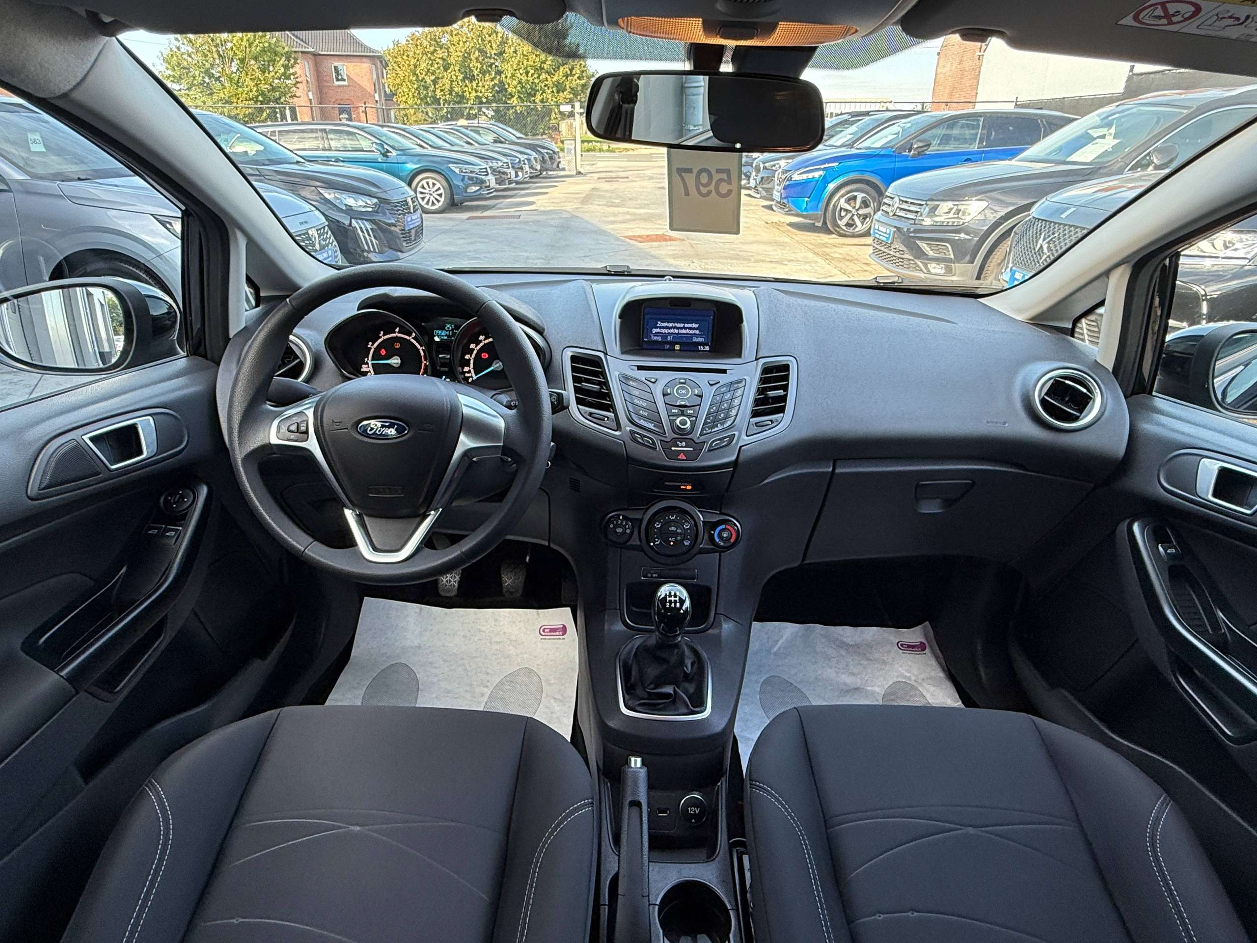 65f05344-bf4e-47f3-afd1-1af5adf1f26e27-ford-fiesta-1-0i-ecoboost-100pk-bluetooth-airco-carpass-garantie.jpg
