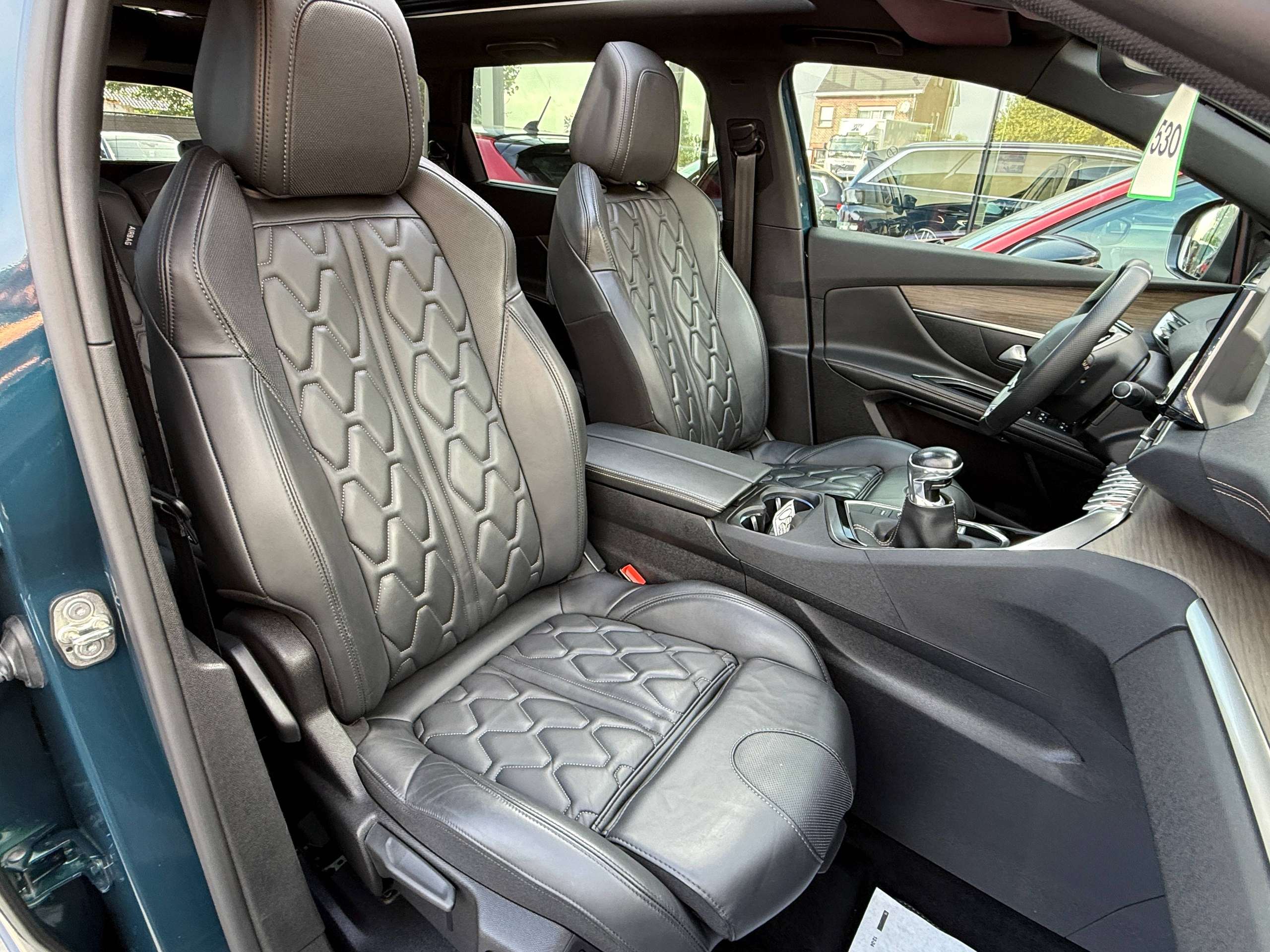 7fd30768-f5af-4515-8b83-32d89b83efee39-peugeot-5008-1-2i-130pk-gt-line-7-zetels-opendak-zwart-leder-navi-camera-carplay-led-alu.jpg