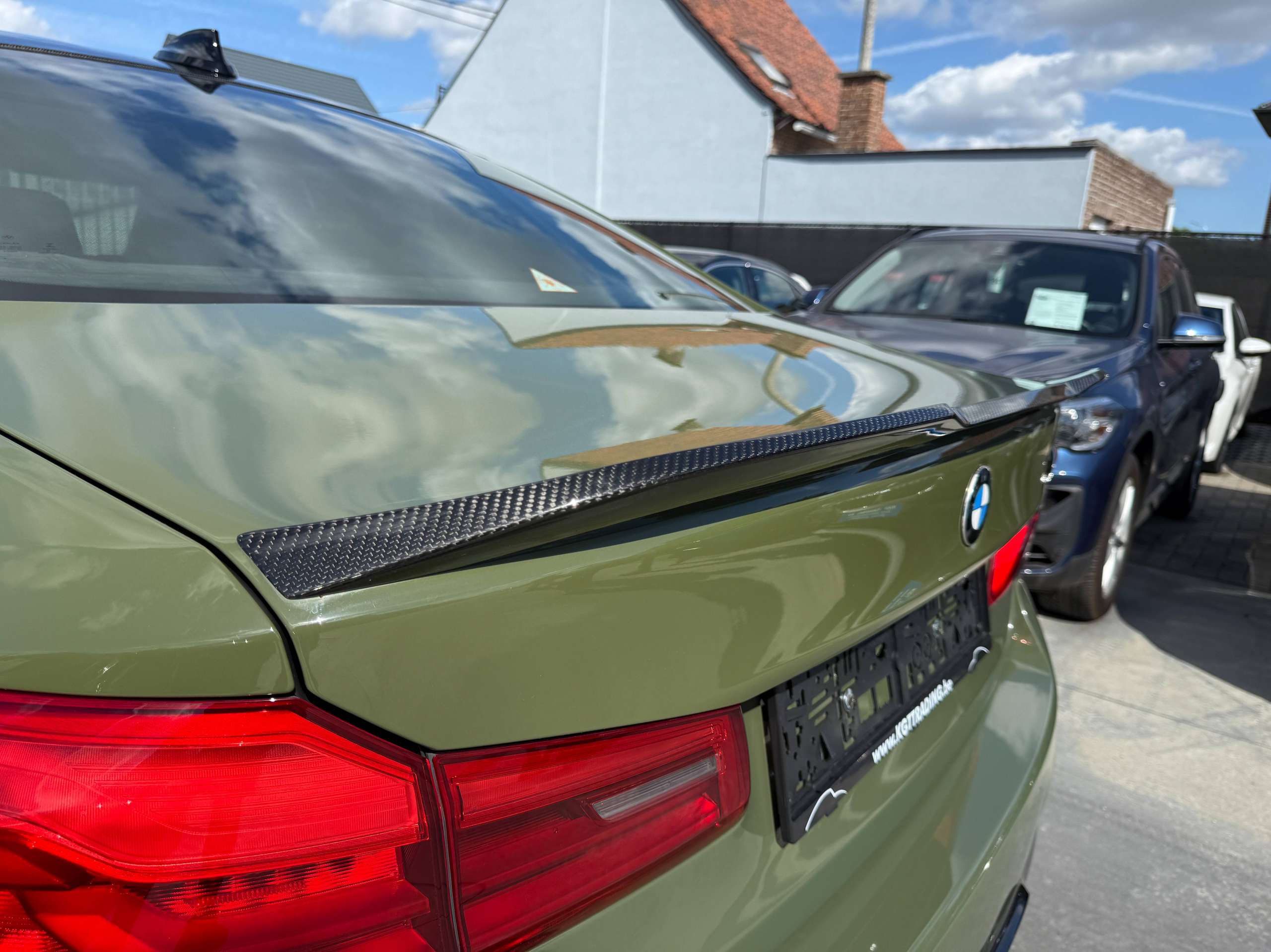 9f30ac9f-066e-4b50-bcc6-ec60099ab17015-bmw-m5-4-4as-v8-competition-keramisch-urban-green-bowerswilkins-carbon-full-full.jpg