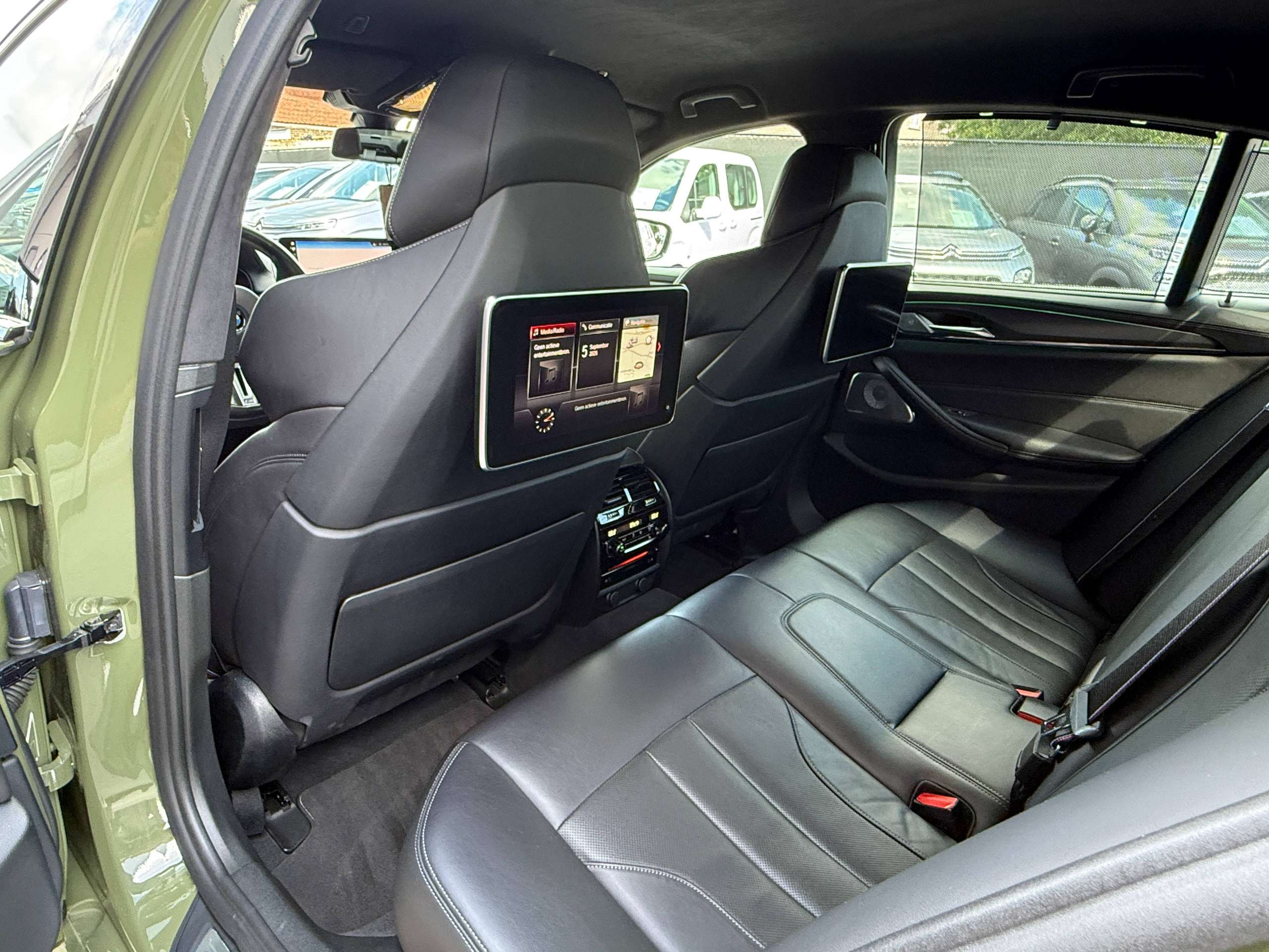9f30ac9f-066e-4b50-bcc6-ec60099ab17020-bmw-m5-4-4as-v8-competition-keramisch-urban-green-bowerswilkins-carbon-full-full.jpg