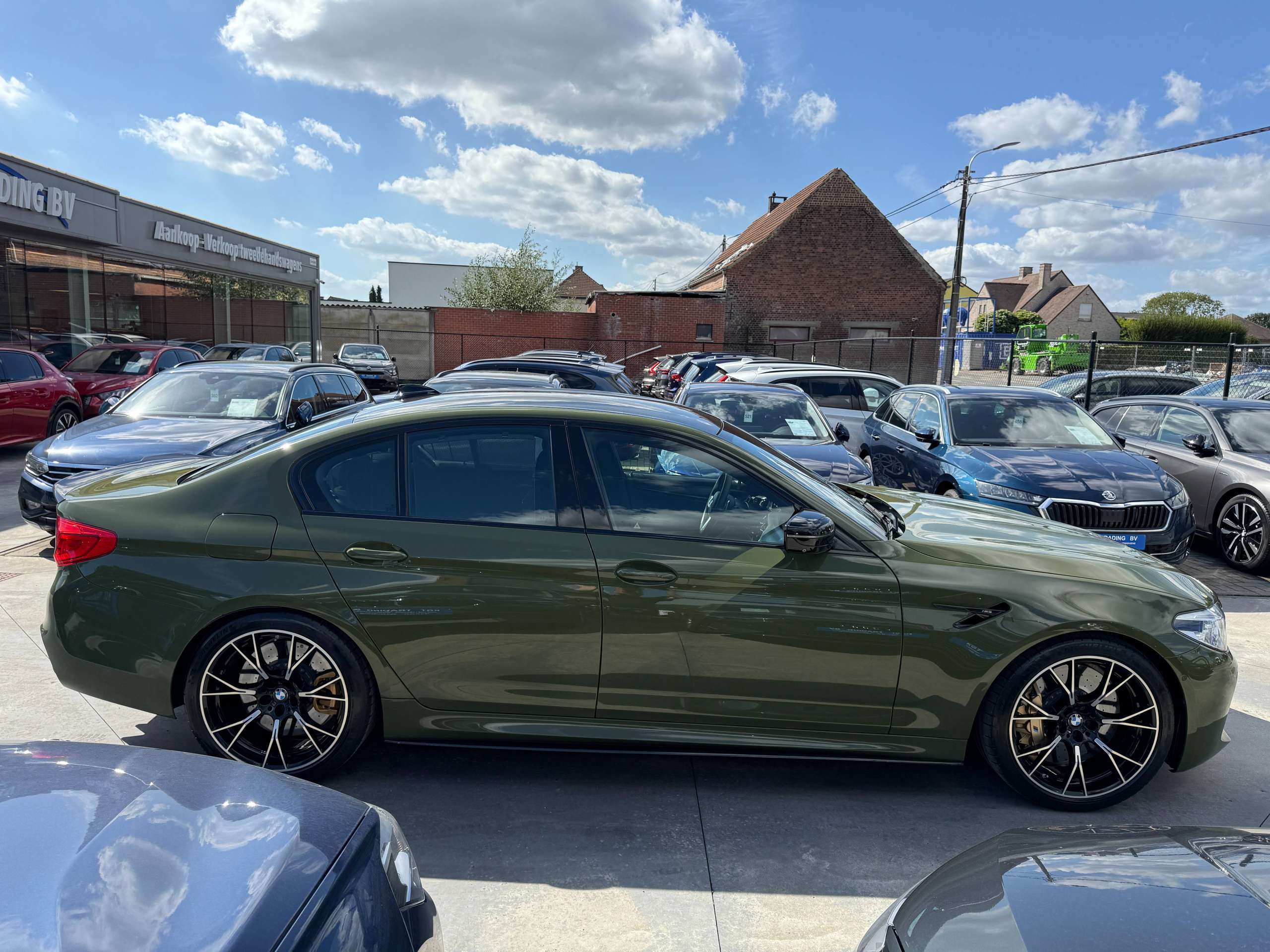 9f30ac9f-066e-4b50-bcc6-ec60099ab1704-bmw-m5-4-4as-v8-competition-keramisch-urban-green-bowerswilkins-carbon-full-full.jpg