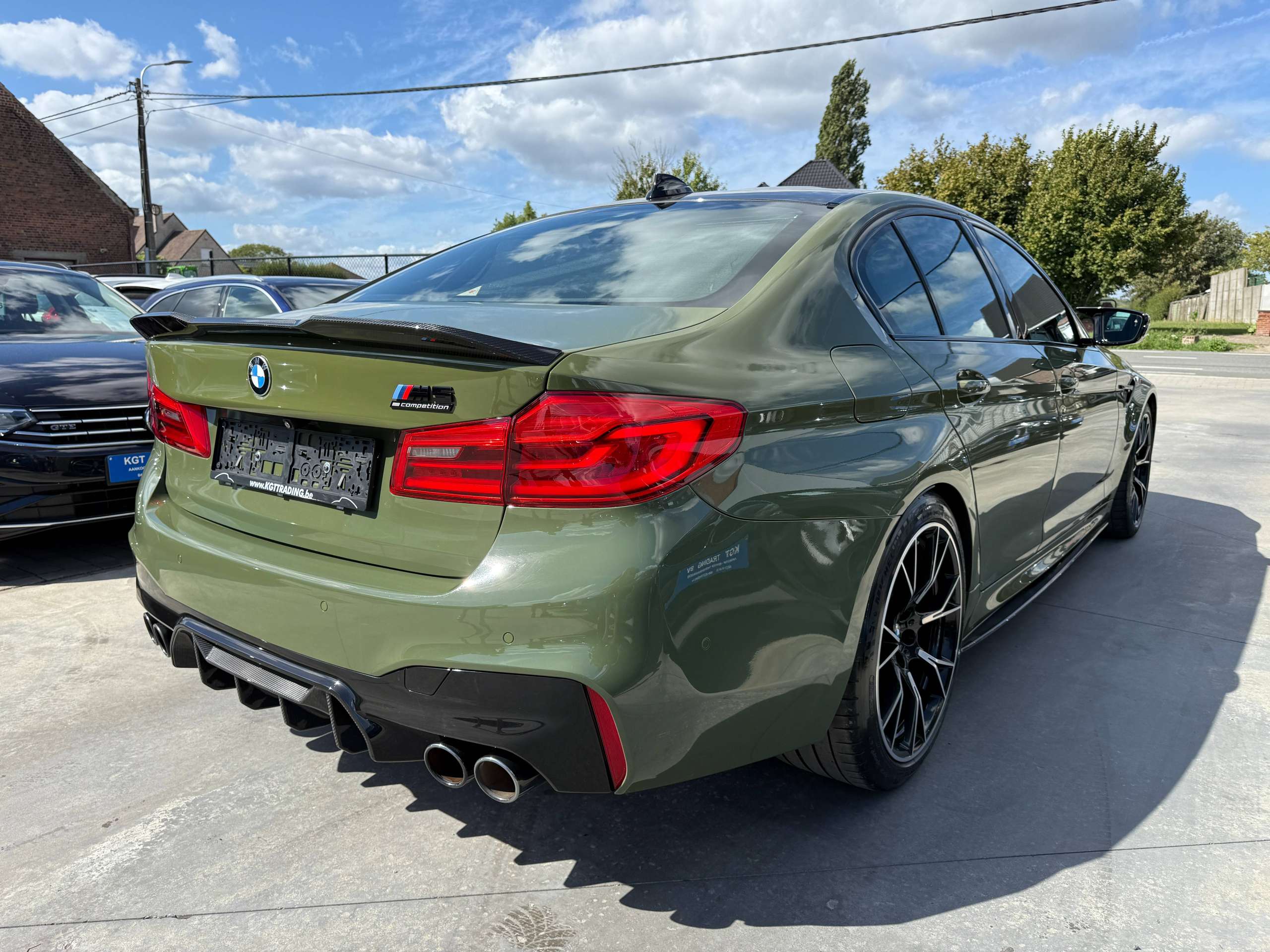 9f30ac9f-066e-4b50-bcc6-ec60099ab1705-bmw-m5-4-4as-v8-competition-keramisch-urban-green-bowerswilkins-carbon-full-full.jpg