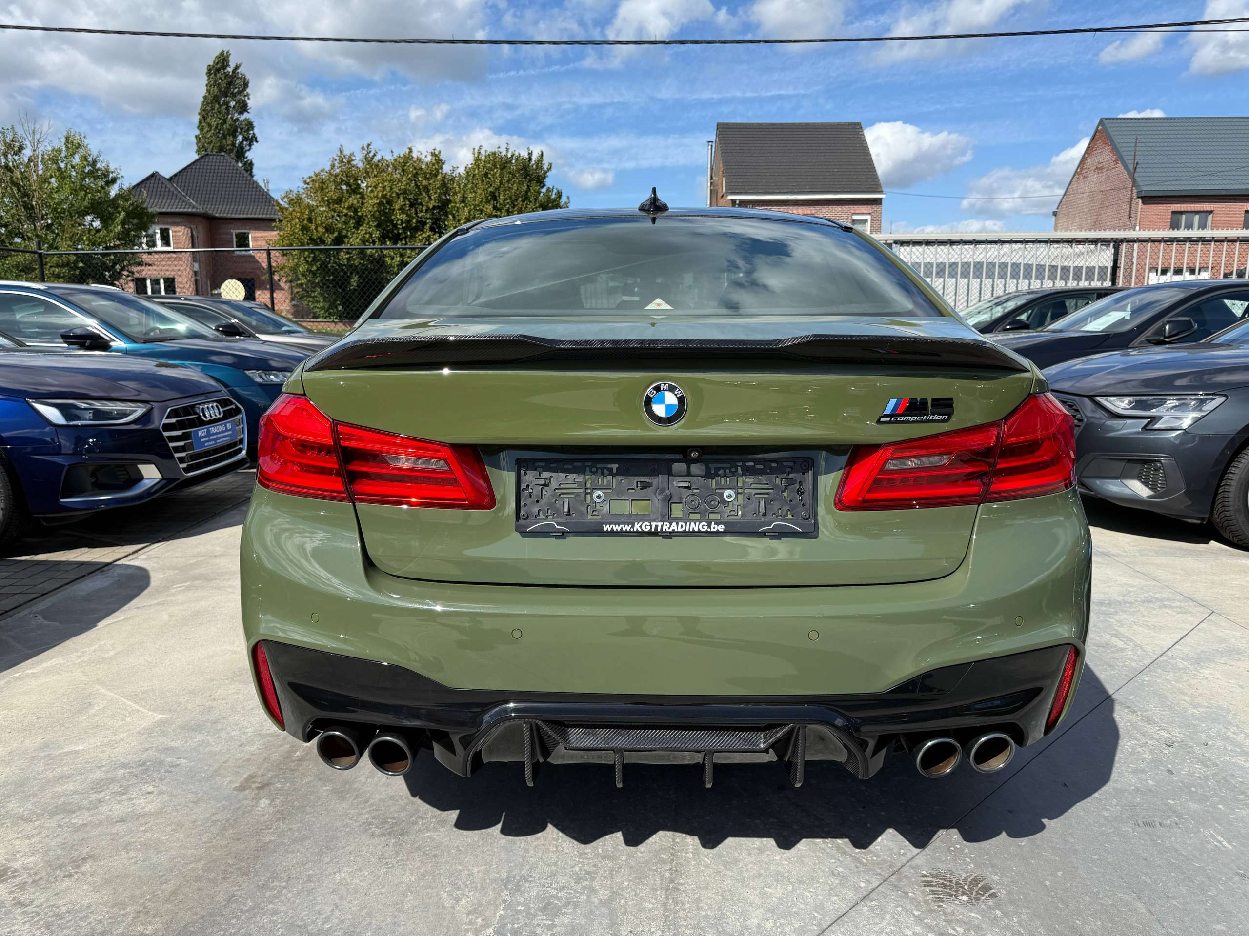 9f30ac9f-066e-4b50-bcc6-ec60099ab1706-bmw-m5-4-4as-v8-competition-keramisch-urban-green-bowerswilkins-carbon-full-full.jpg
