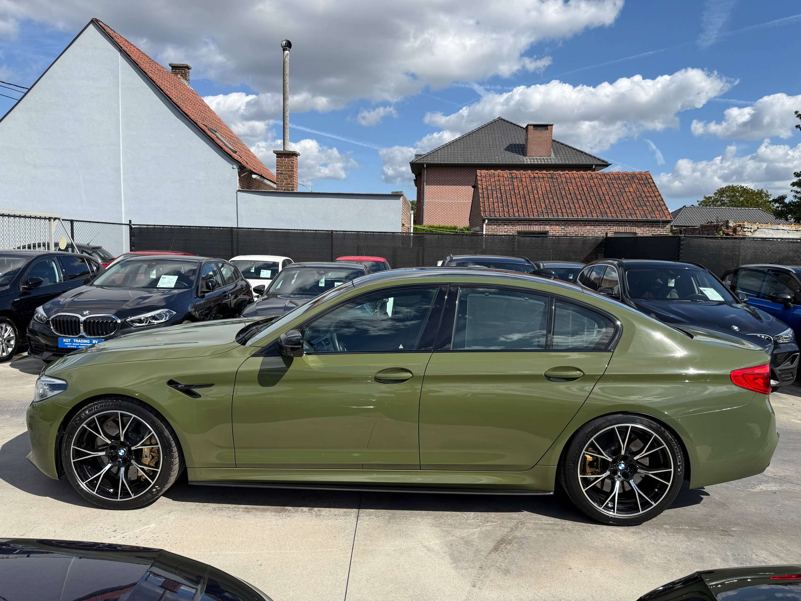 9f30ac9f-066e-4b50-bcc6-ec60099ab1708-bmw-m5-4-4as-v8-competition-keramisch-urban-green-bowerswilkins-carbon-full-full.jpg