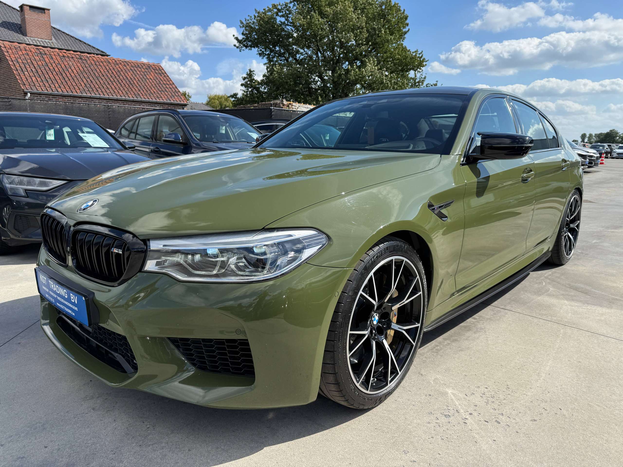 9f30ac9f-066e-4b50-bcc6-ec60099ab1709-bmw-m5-4-4as-v8-competition-keramisch-urban-green-bowerswilkins-carbon-full-full.jpg
