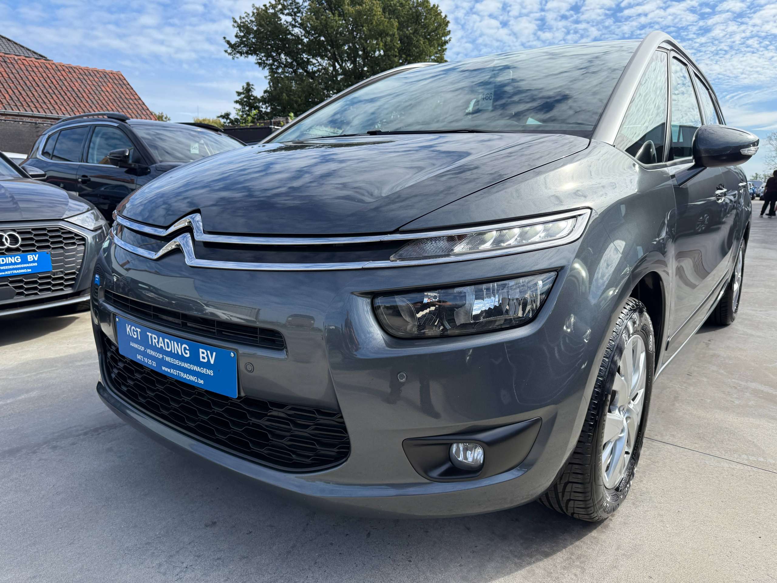 df9ecd55-9f3c-4103-95e6-8e51926e6e2d10-citroen-grand-c4-picasso-1-6-bluehdi-115pk-7-zetels-euro-6b-navigatie-bluetooth-pdc-led-trekhaak-alu.jpg