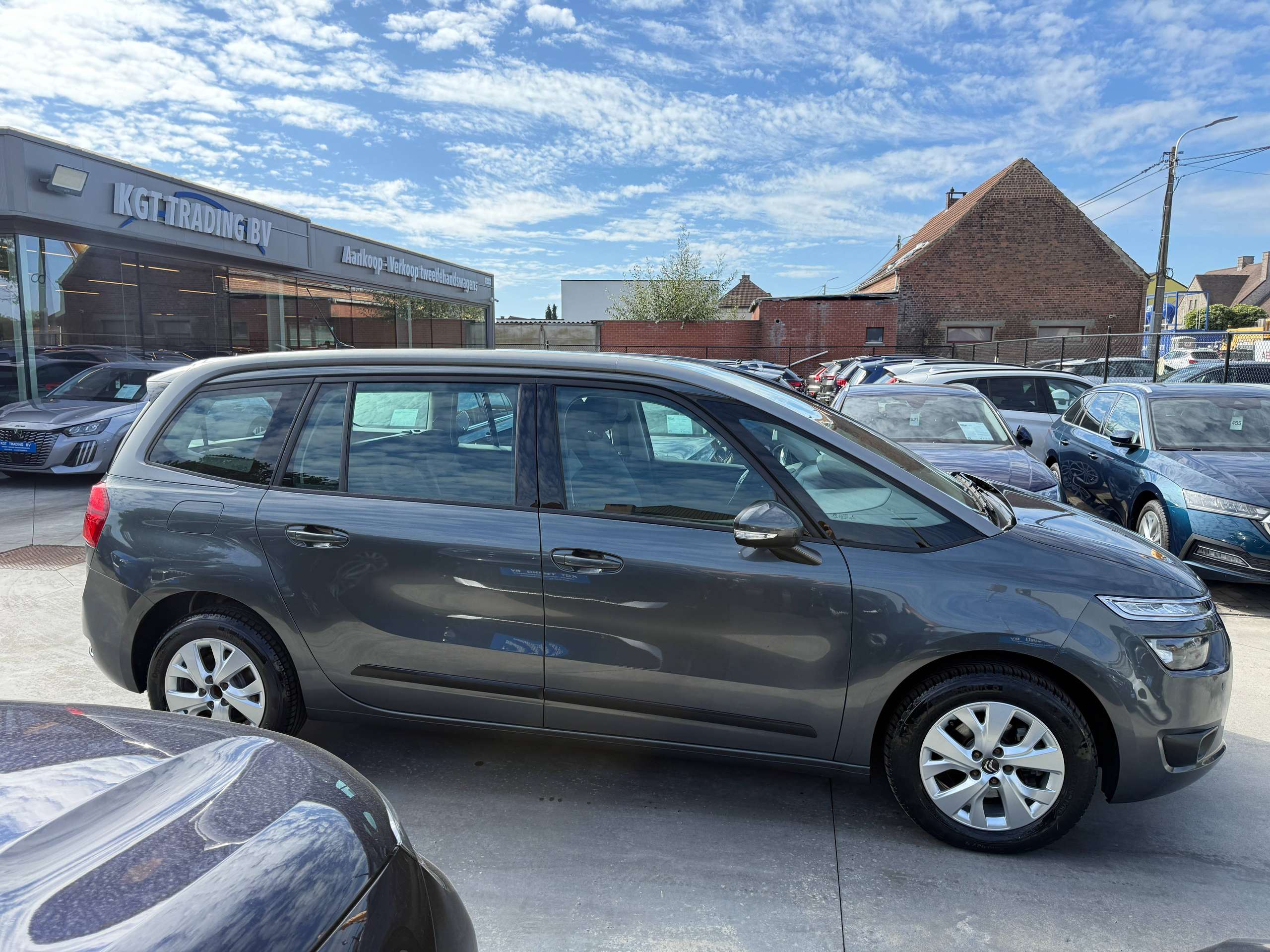 df9ecd55-9f3c-4103-95e6-8e51926e6e2d4-citroen-grand-c4-picasso-1-6-bluehdi-115pk-7-zetels-euro-6b-navigatie-bluetooth-pdc-led-trekhaak-alu.jpg