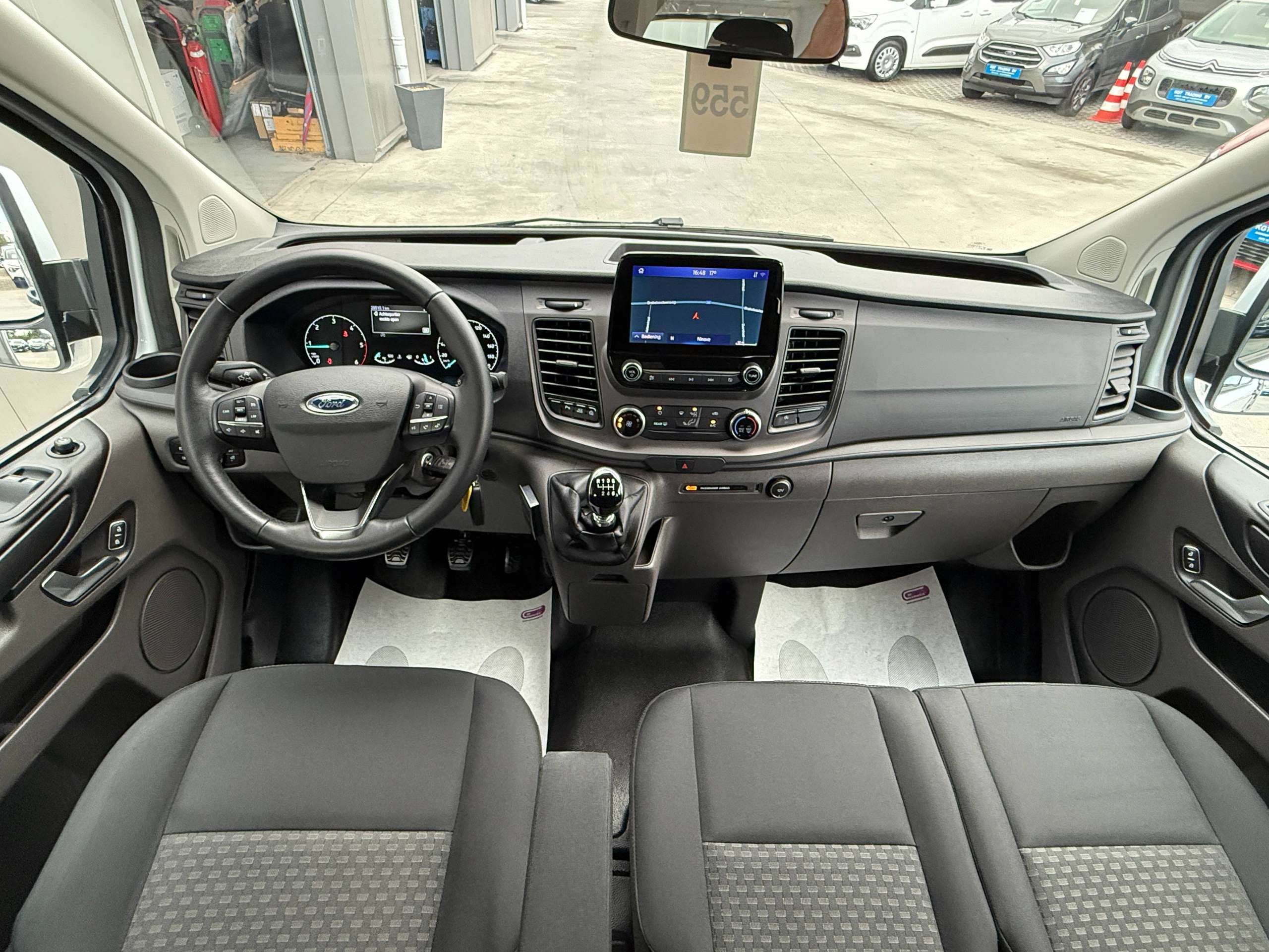 f176cb1a-5756-45f1-9f6f-26682725e85628-ford-transit-custom-2-0-tdci-9-zetels-navigatie-carplay-led-bluetooth-pdc-carpass-nieuwstaat.jpg