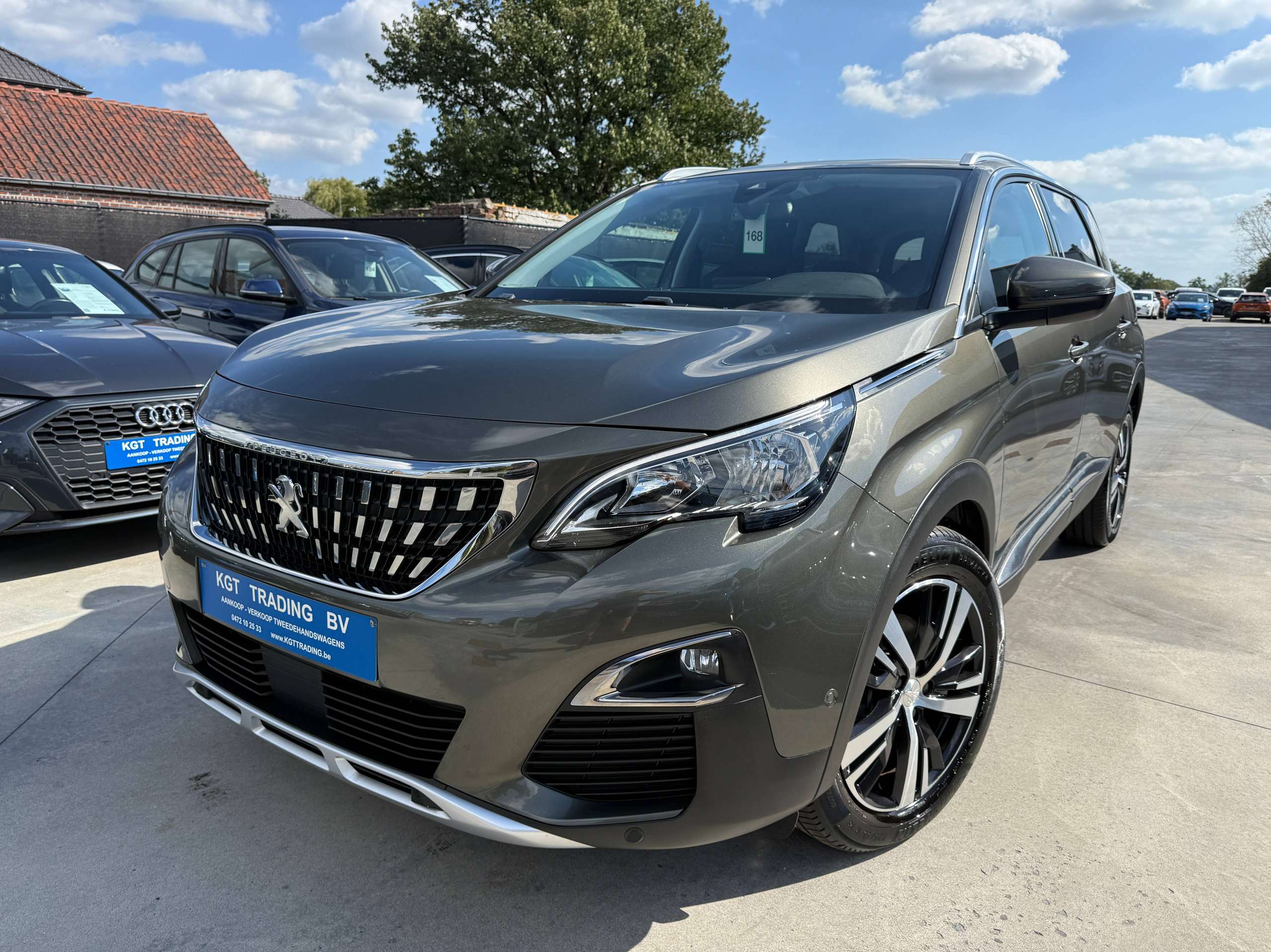 f874540f-257d-4293-b188-4f9145fff14c1-peugeot-5008-1-2i-130pk-7-zetels-navigatie-leder-camera-carplay-dab-pdc.jpg